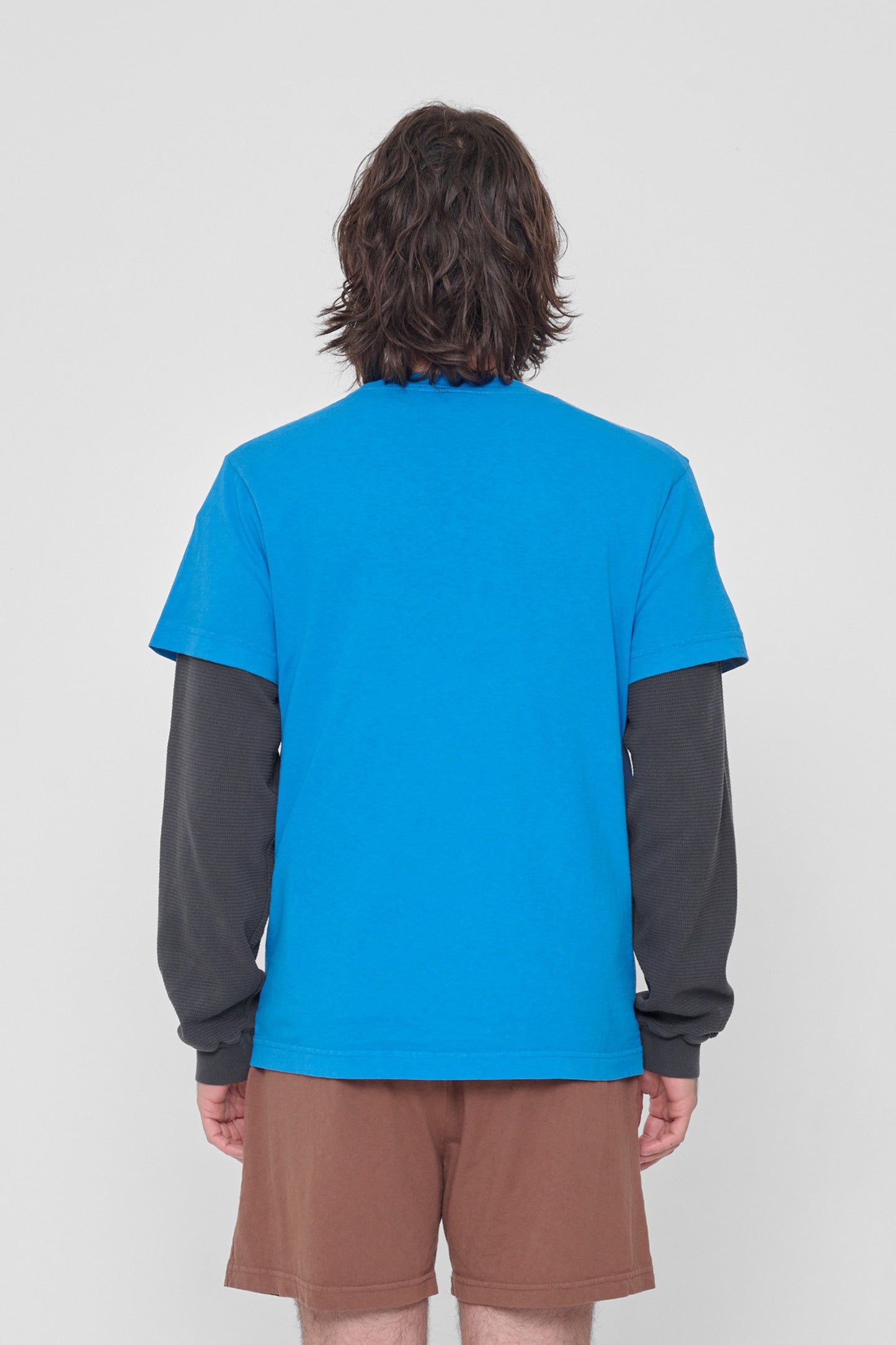 Back view shows relaxed fit throughout.