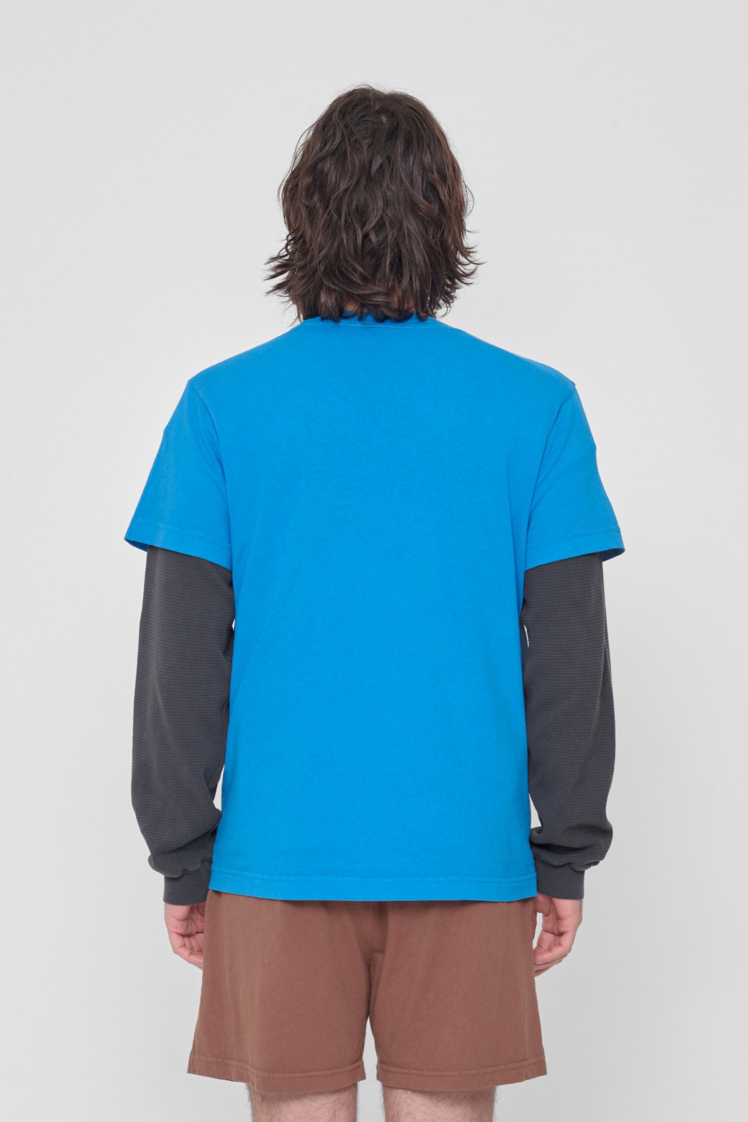 Back view shows relaxed fit throughout.