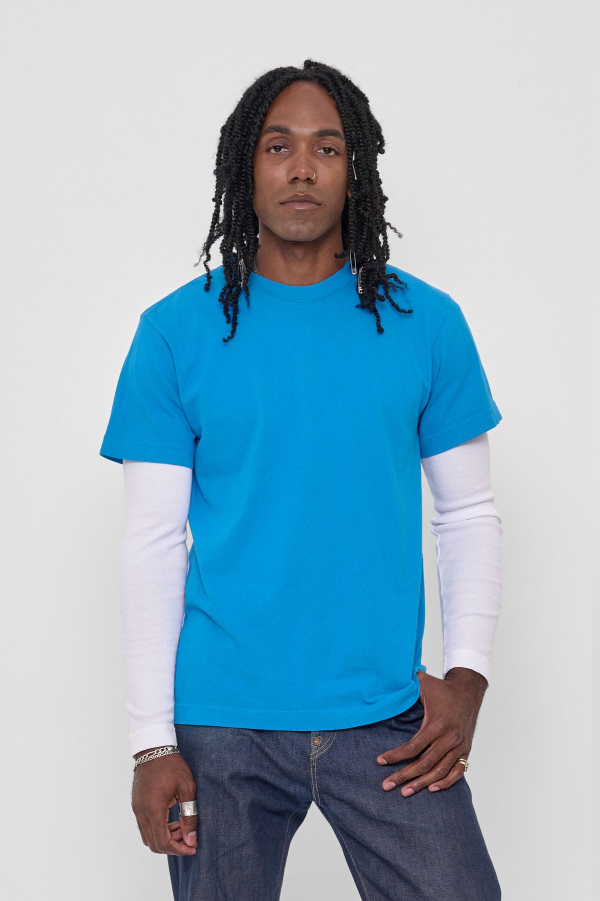 Short Sleeve Trash Tee in Malibu – front view on model, layered over a White Rib Long Sleeve