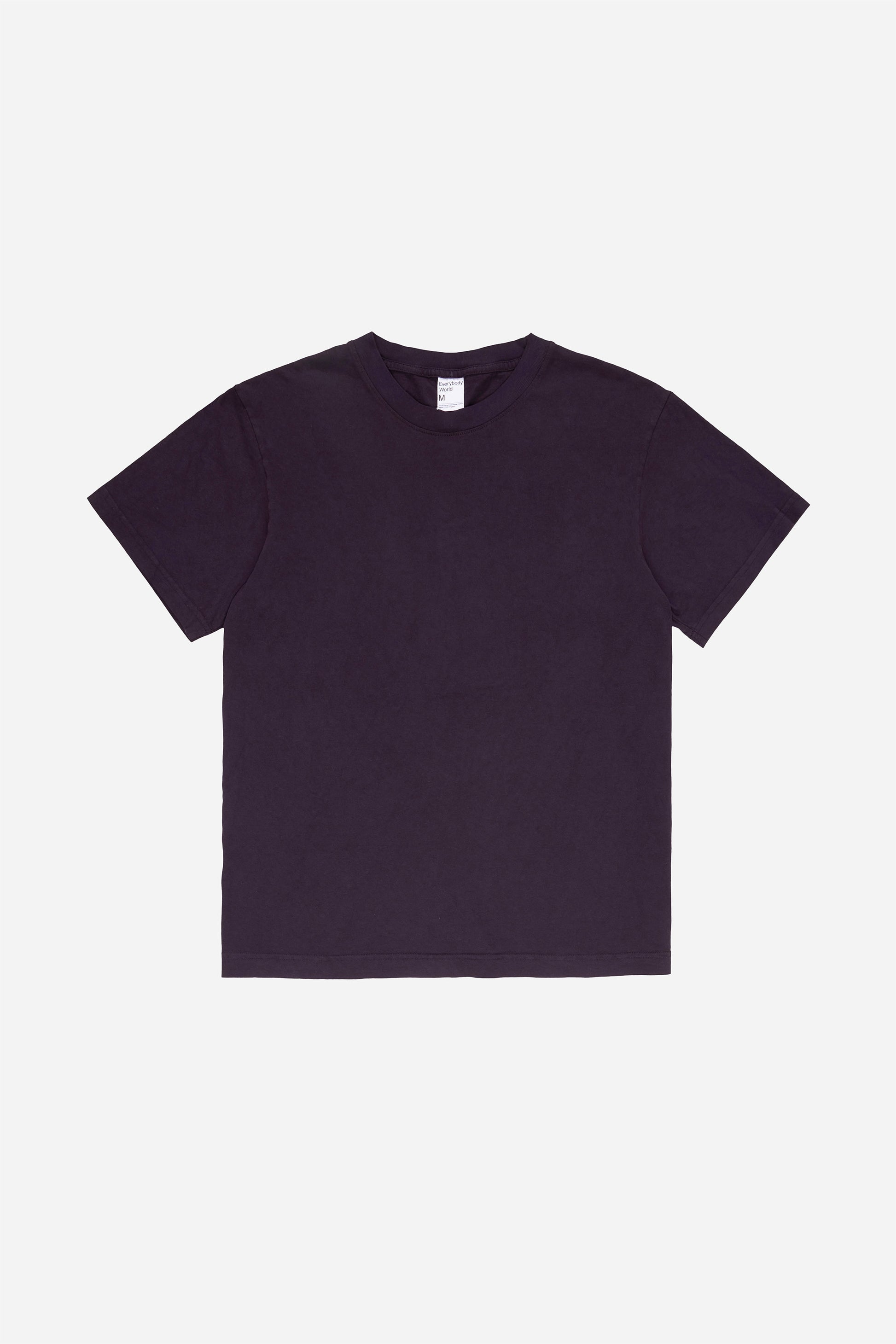Flat lay of the Short Sleeve Trash Tee in Mulberry, showing the classic cut of the dark purple  garment.