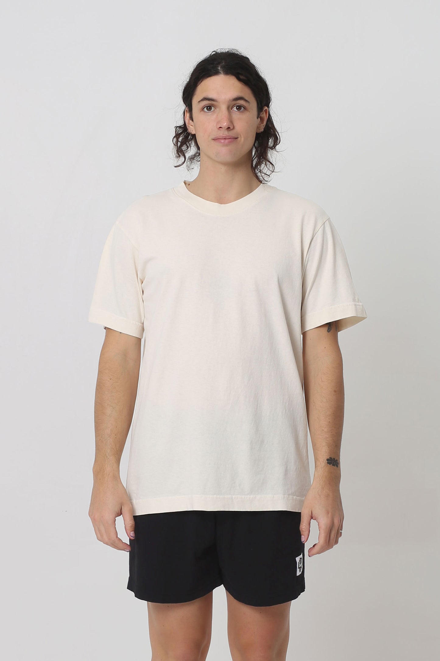 6' person in a size M Scour Short Sleeve Trash Tee. Hem ends just below the hip.