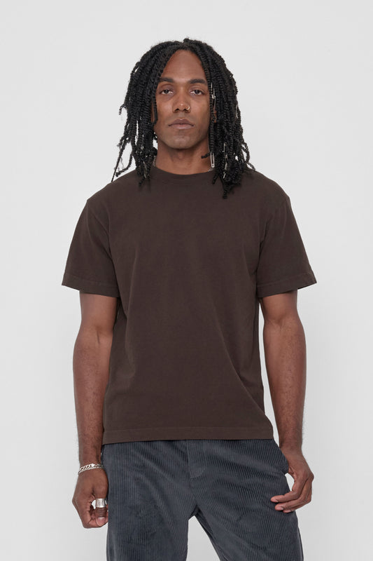 Short Sleeve Trash Tee in Wet Soil – front view on model