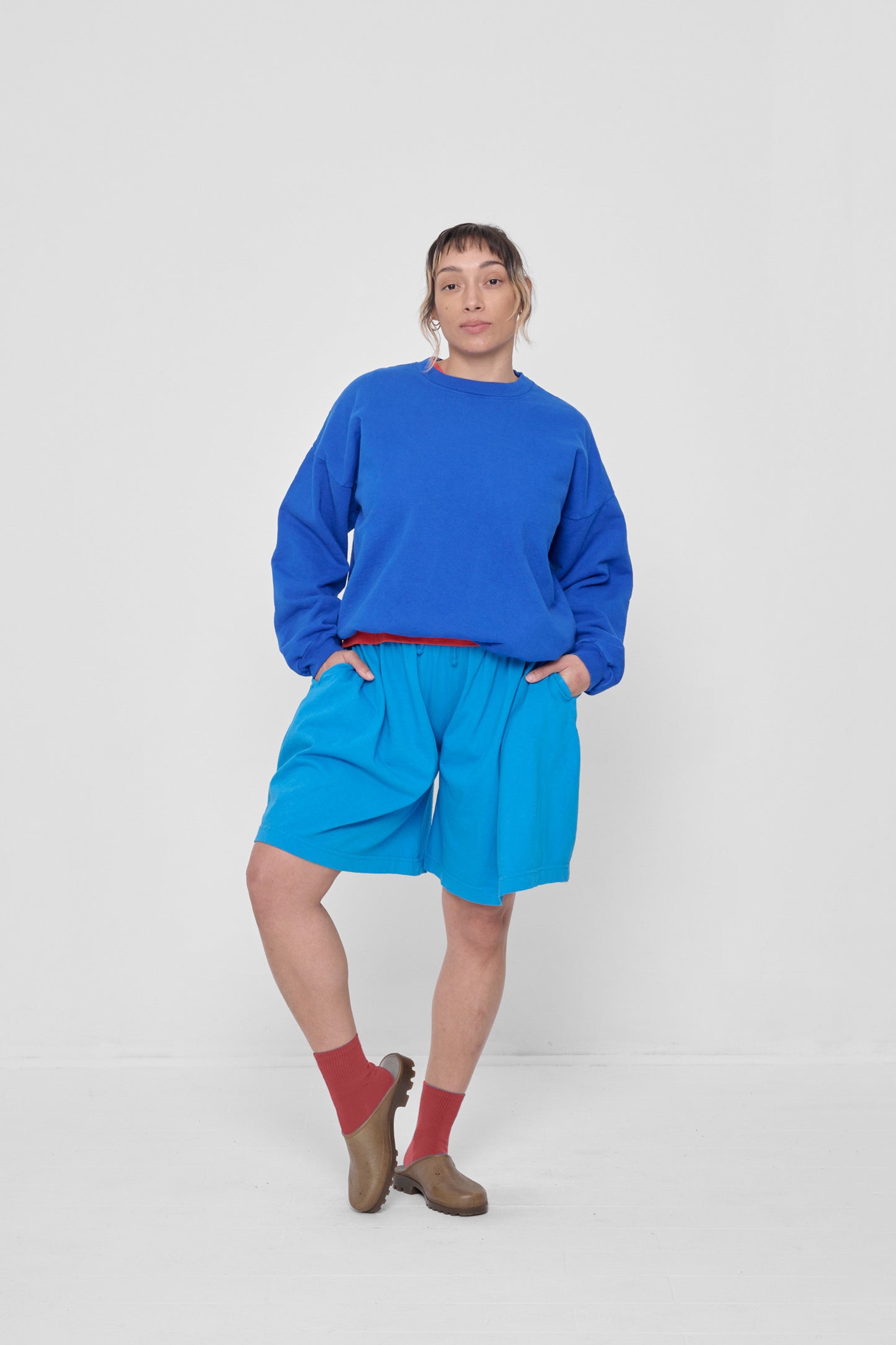 Styled with Lapis Trash Crewneck and Malibu Long Tubular Shorts.