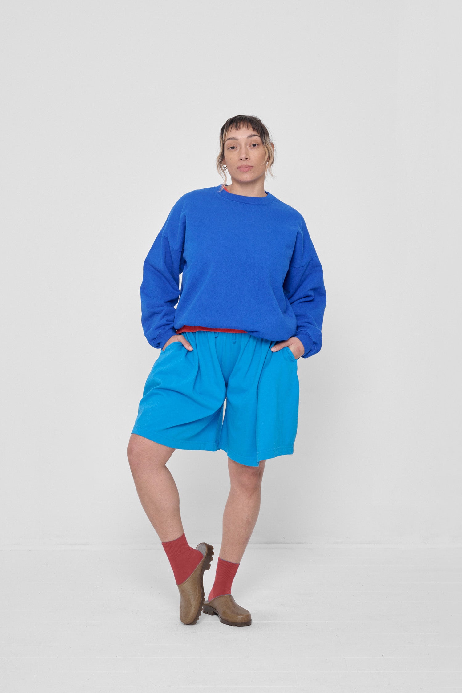 Styled with Lapis Trash Crewneck and Malibu Long Tubular Shorts.