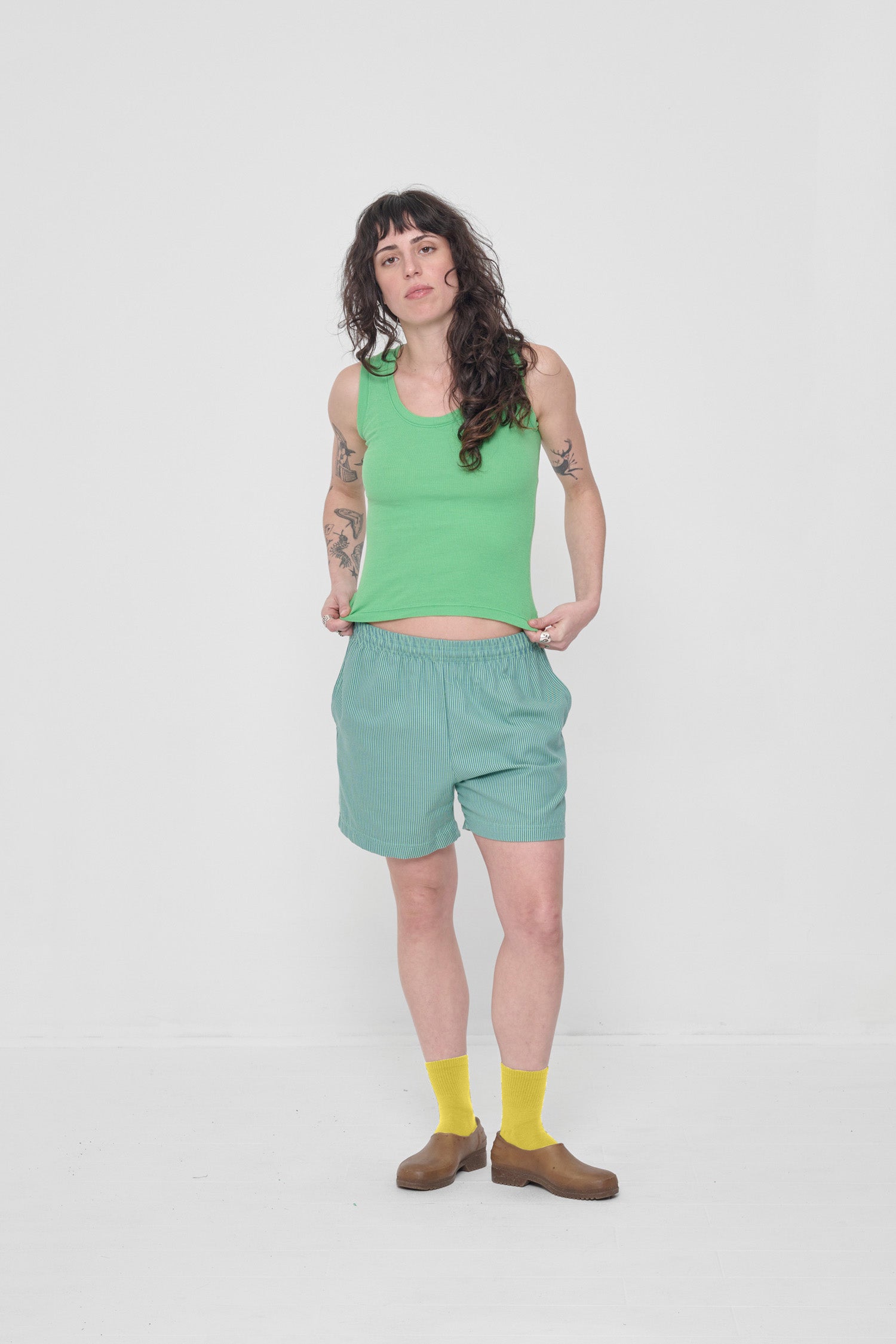 Styled with Nice Grass The Tank and Stripe Everyday Shorts.