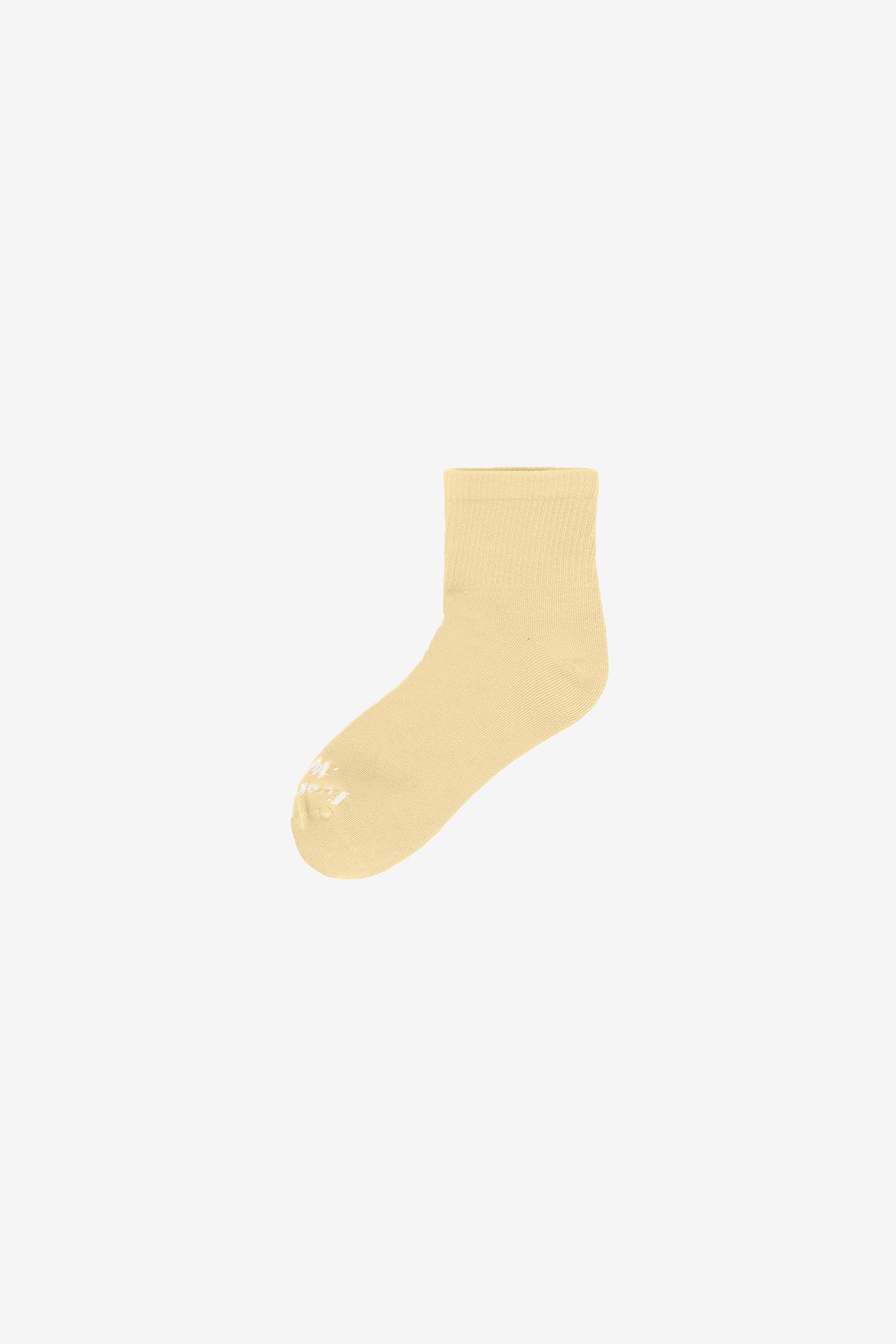 Flat lay of French Butter Spring Socks with Everybody.World branding in white.