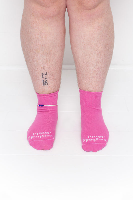 Pixie Spring Socks, branded 'Everybody.World' in white, ankle-high, shown on a person's lower legs.