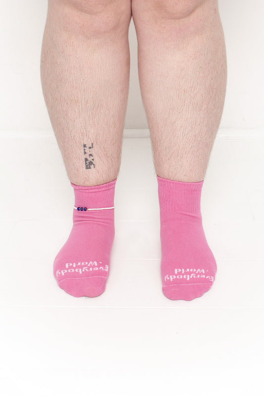 Pixie Spring Socks, branded 'Everybody.World' in white, are ankle-high, shown on a person's lower legs.