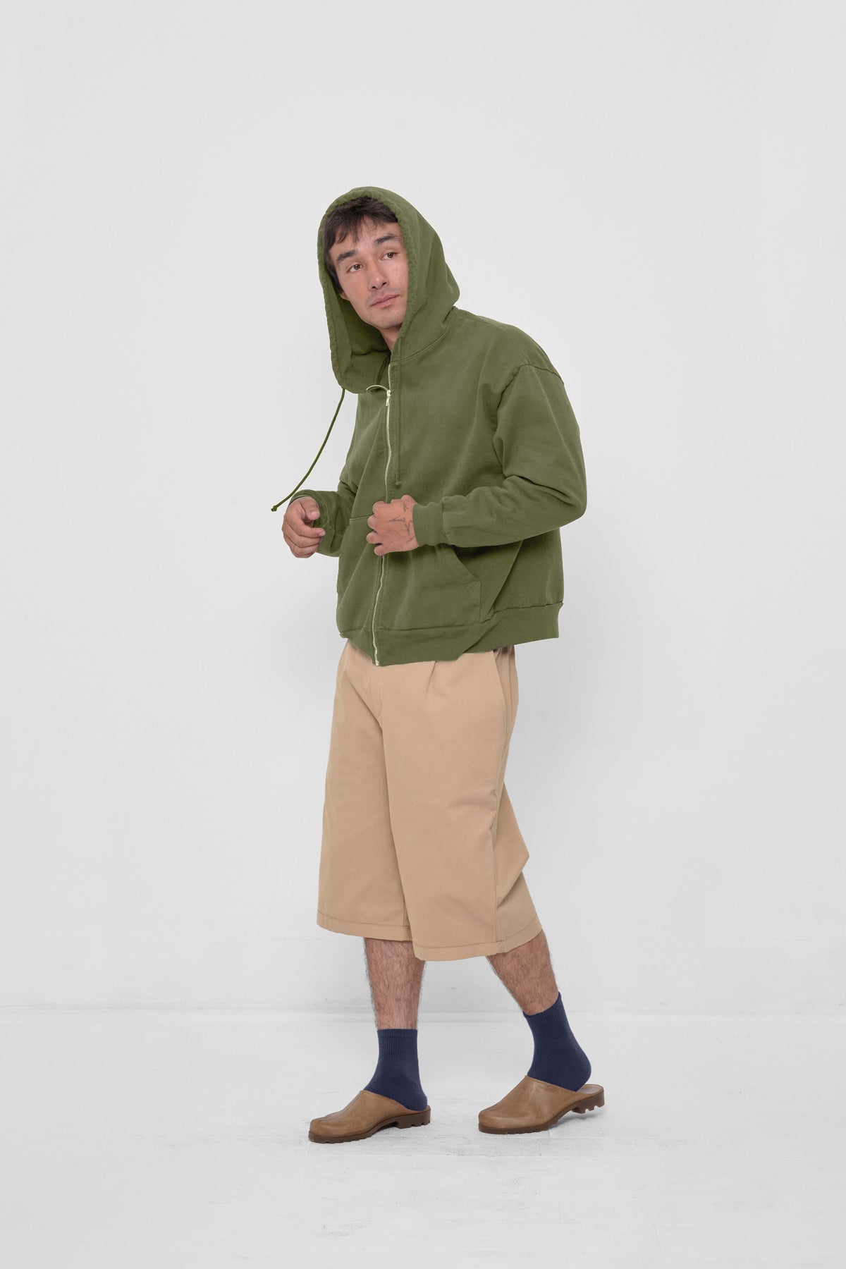 Styled with Olive Trash Zip Up Hoodie, and Sand Storm Bermuda Shorts