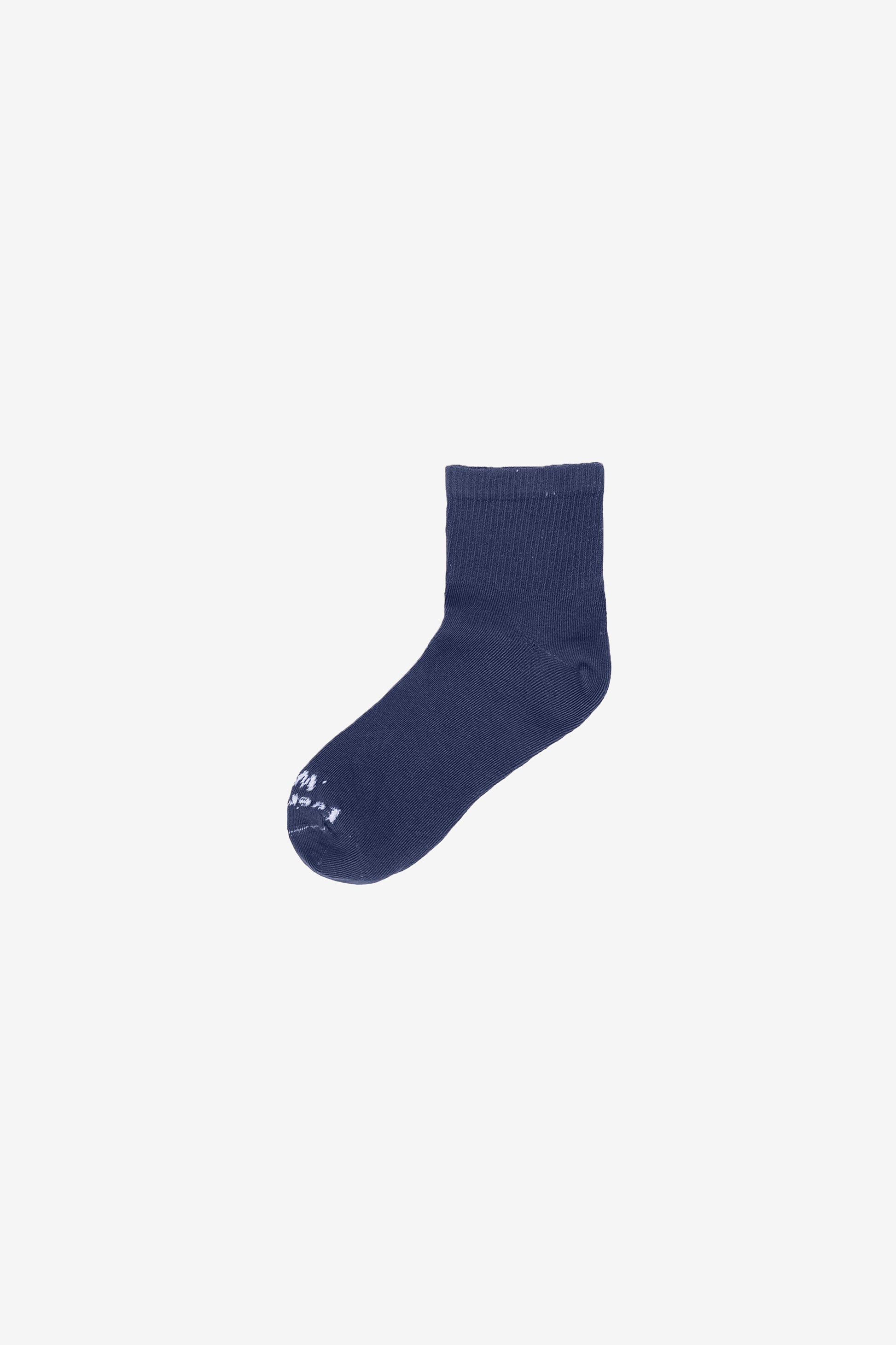 Flat lay of Washed Navy Spring Socks with Everybody.World branding in white.