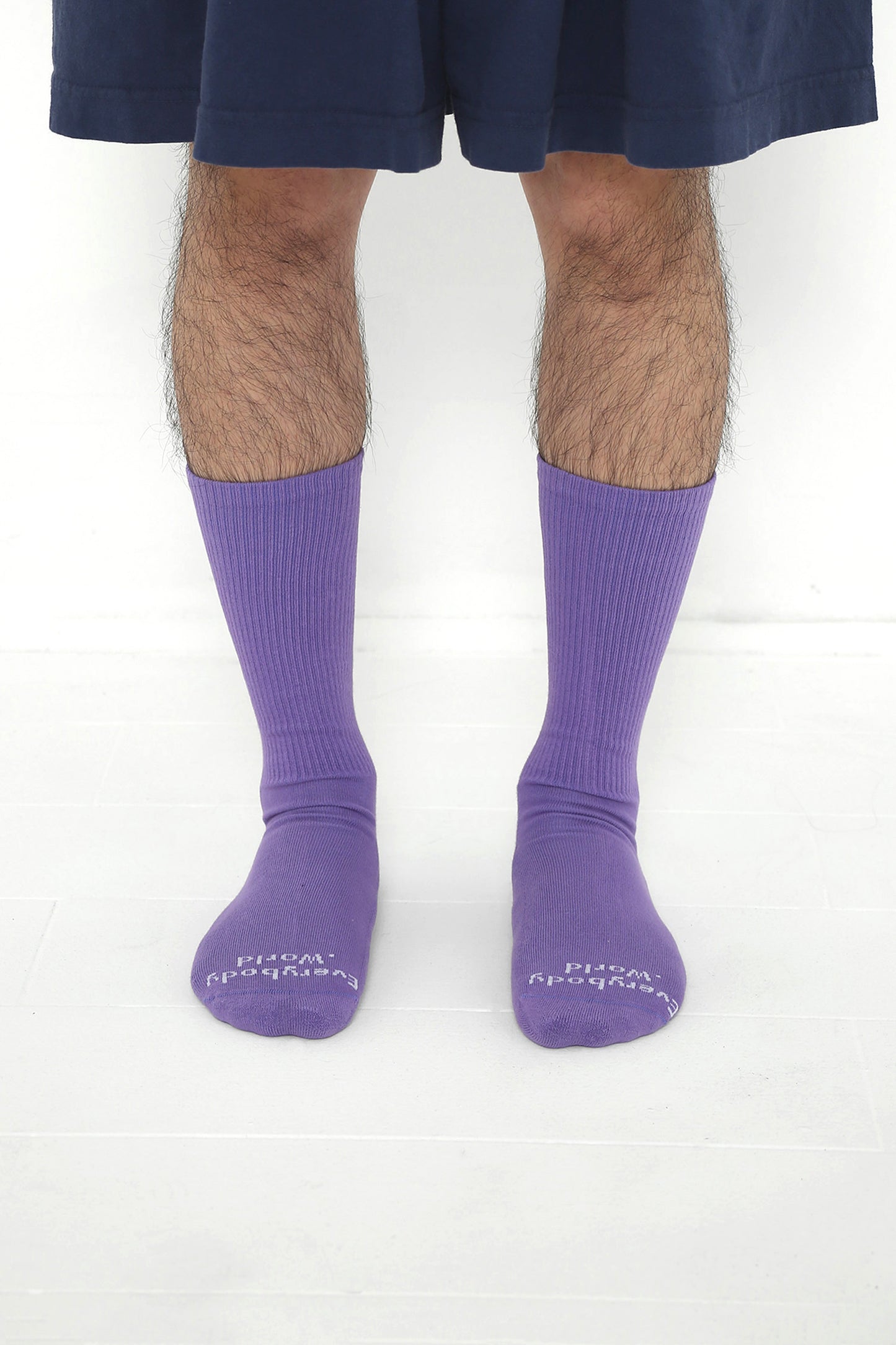 Carpe Diem Socks, branded 'Everybody.World' in white at the toe, mid-calf high.