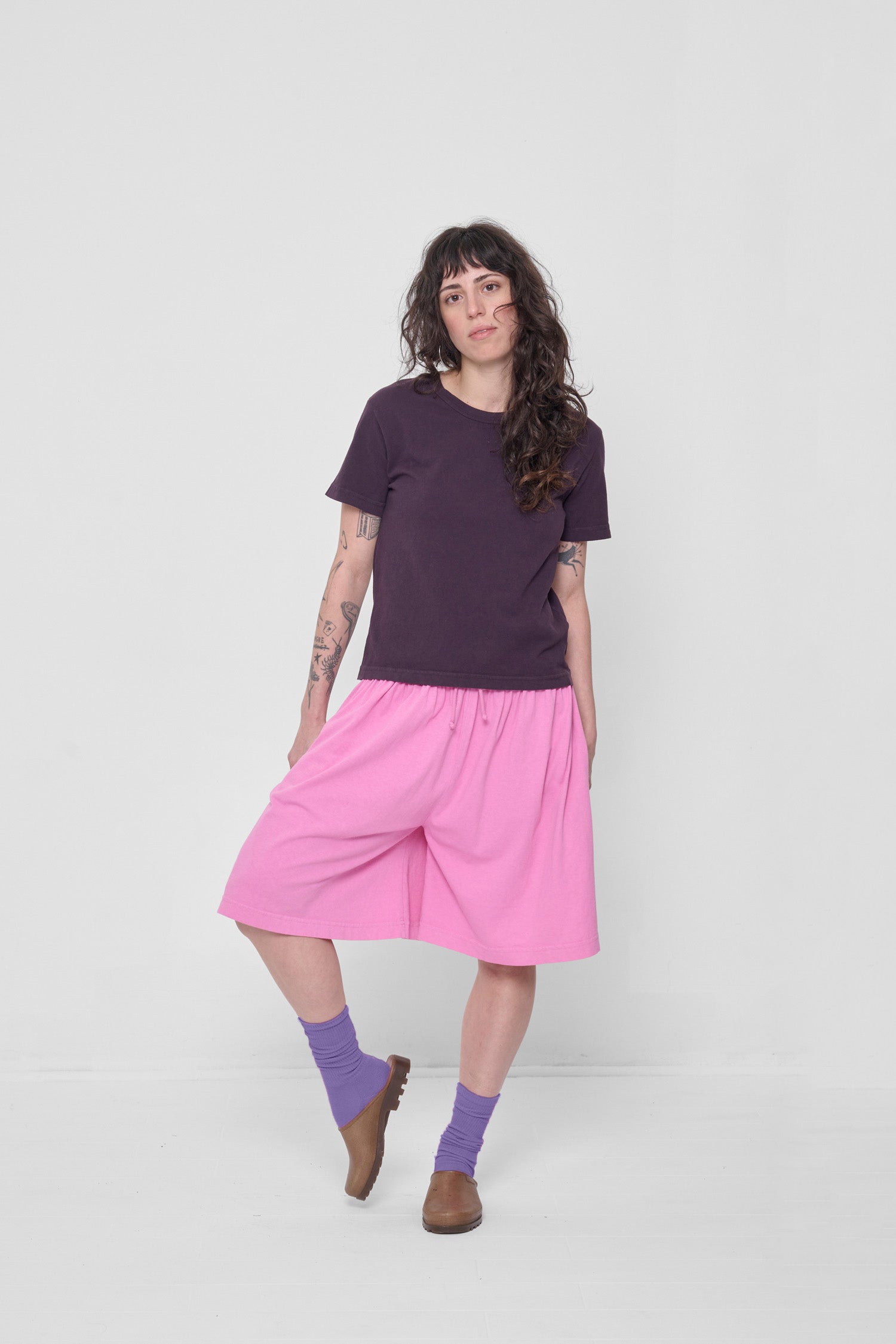 Styled with Mulberry Tailored Trash Tee and Pixie Long Tubular Shorts.