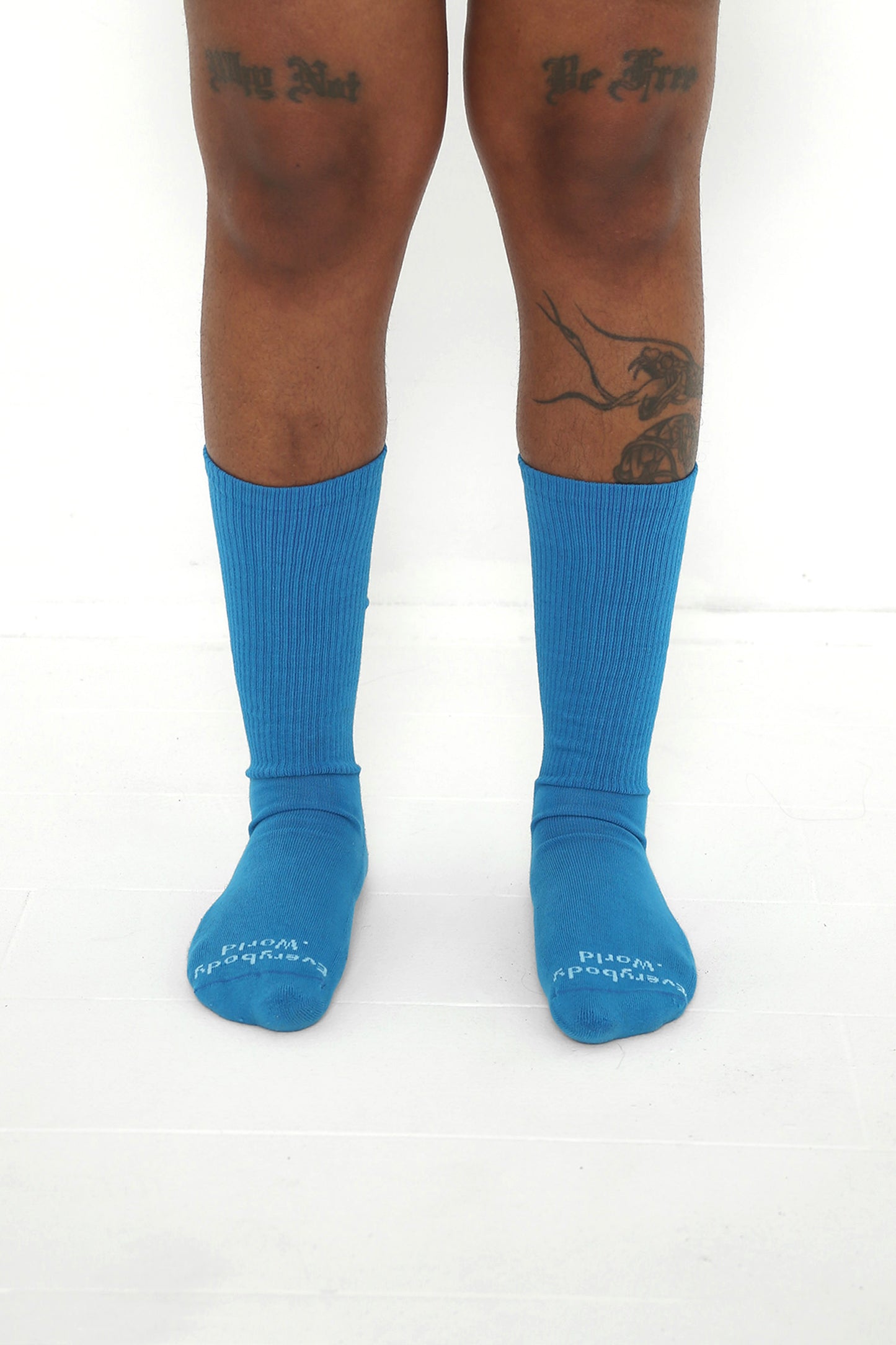 Malibu Socks, branded 'Everybody.World' in white at the toe, mid-calf high.