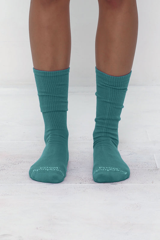 Oyster Socks, branded 'Everybody.World' in white at the toe, mid-calf high.