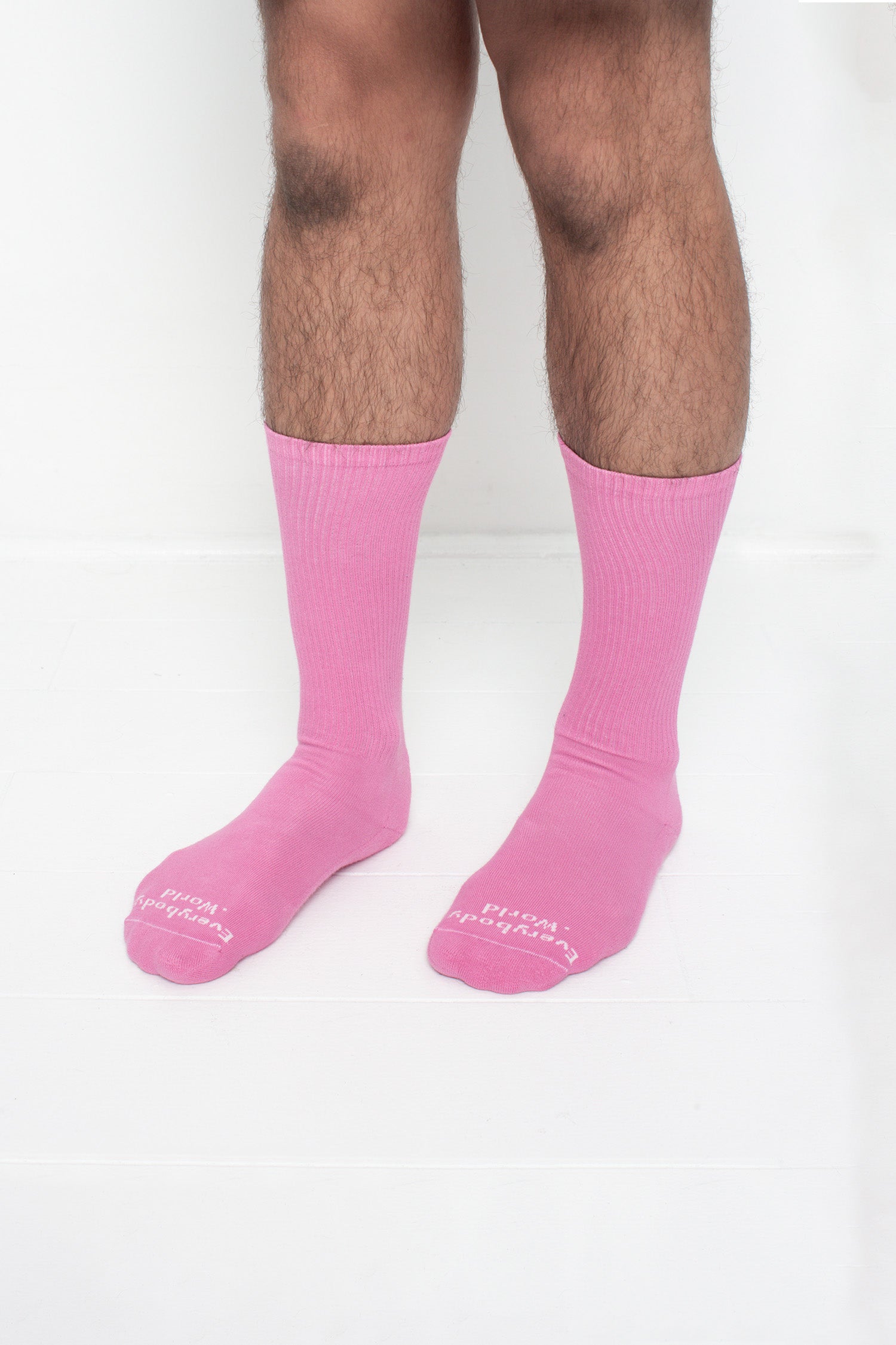 Pixie Squishy Socks, branded 'Everybody.World' in white at the toe, shown on a person's lower legs.