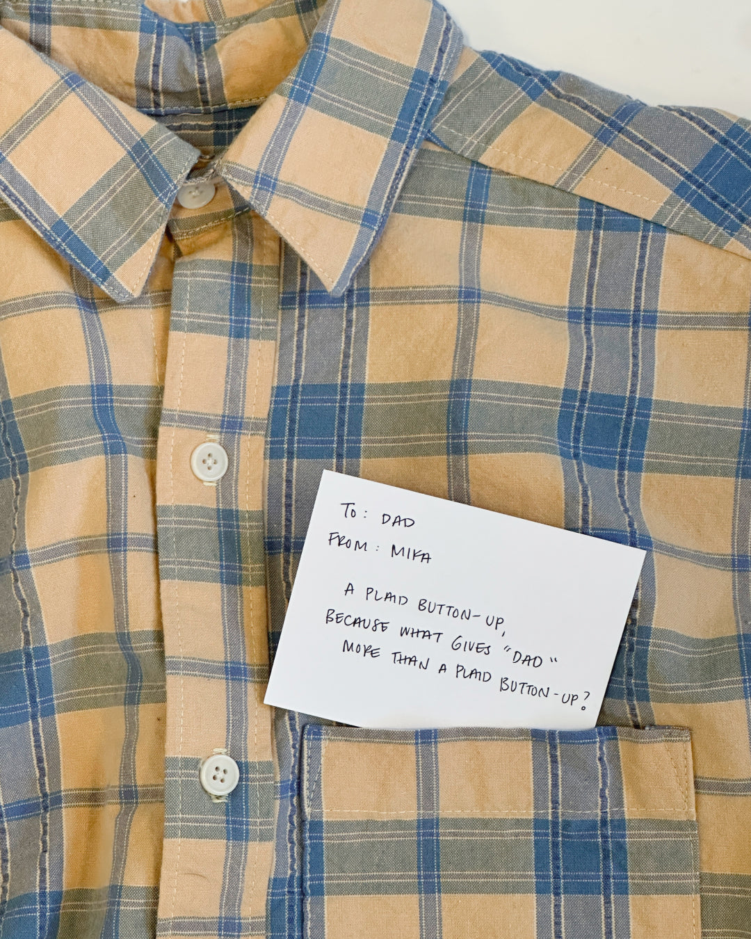 To Dad, from Mika: A Plaid Button-Up, because what gives “Dad” more than a plaid button-up?