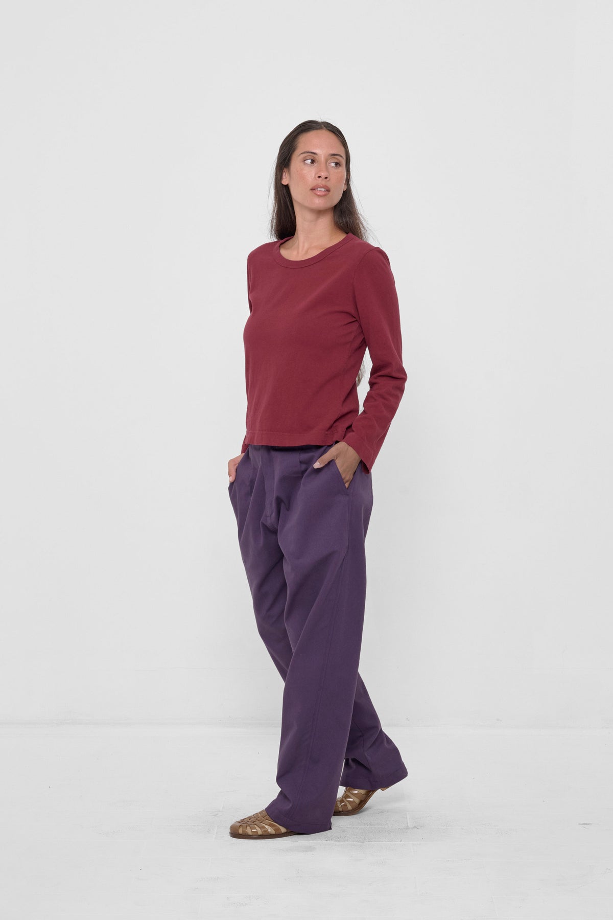 Straight Sleeve Tailored Trash Tee in Garnet – 3/4 front view on model, styled with Washed Mulberry Life Uniform Pants