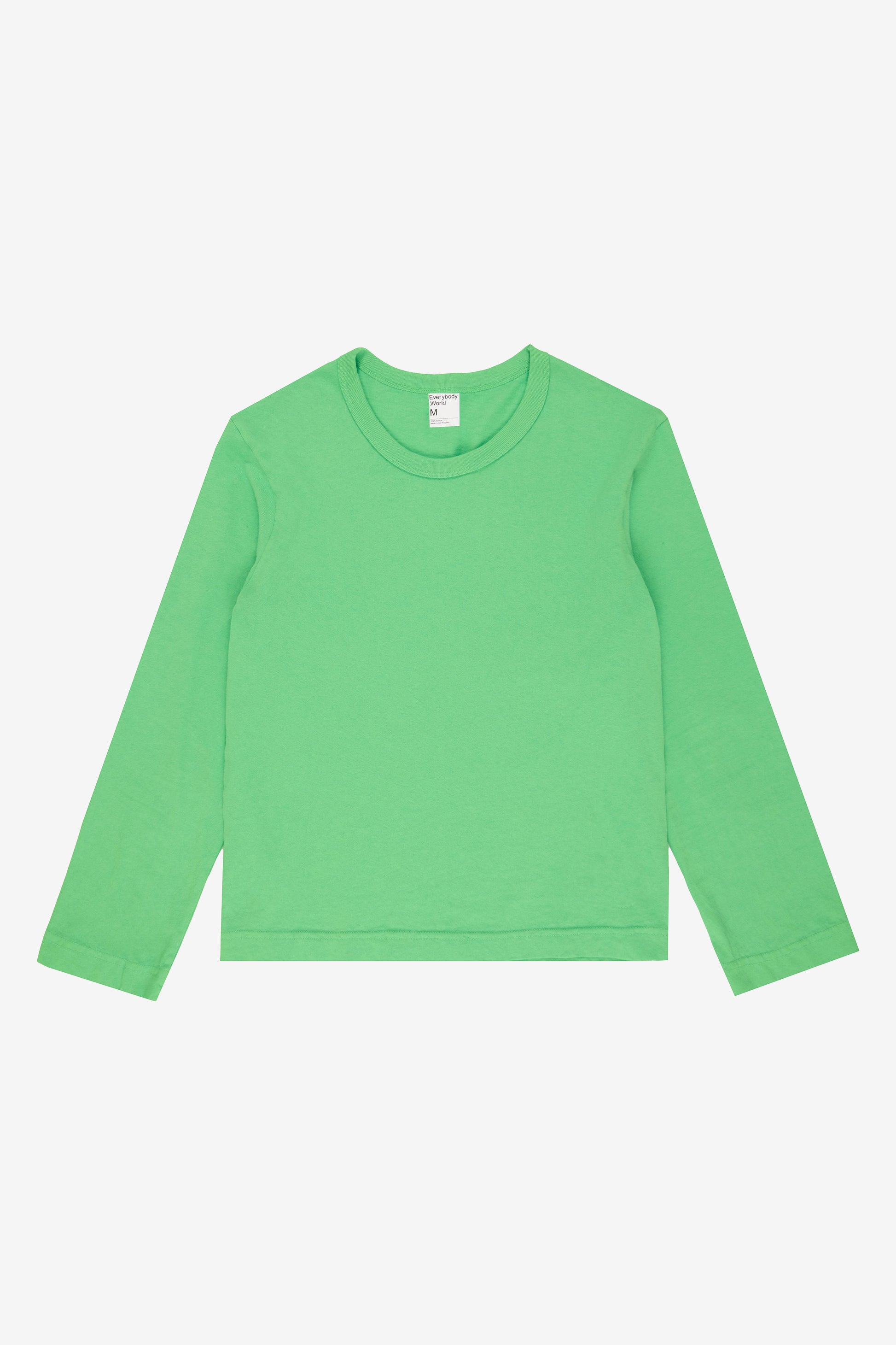 Flat lay showing slim rectangular body and straight long sleeves.