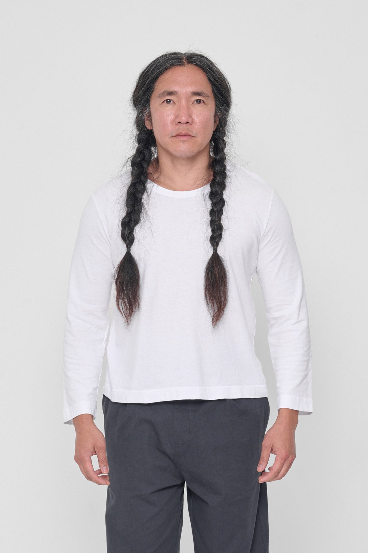 5'11" man in a size L White Straight Sleeve Tailored Trash Tee. Hem at upper-middle hip. 