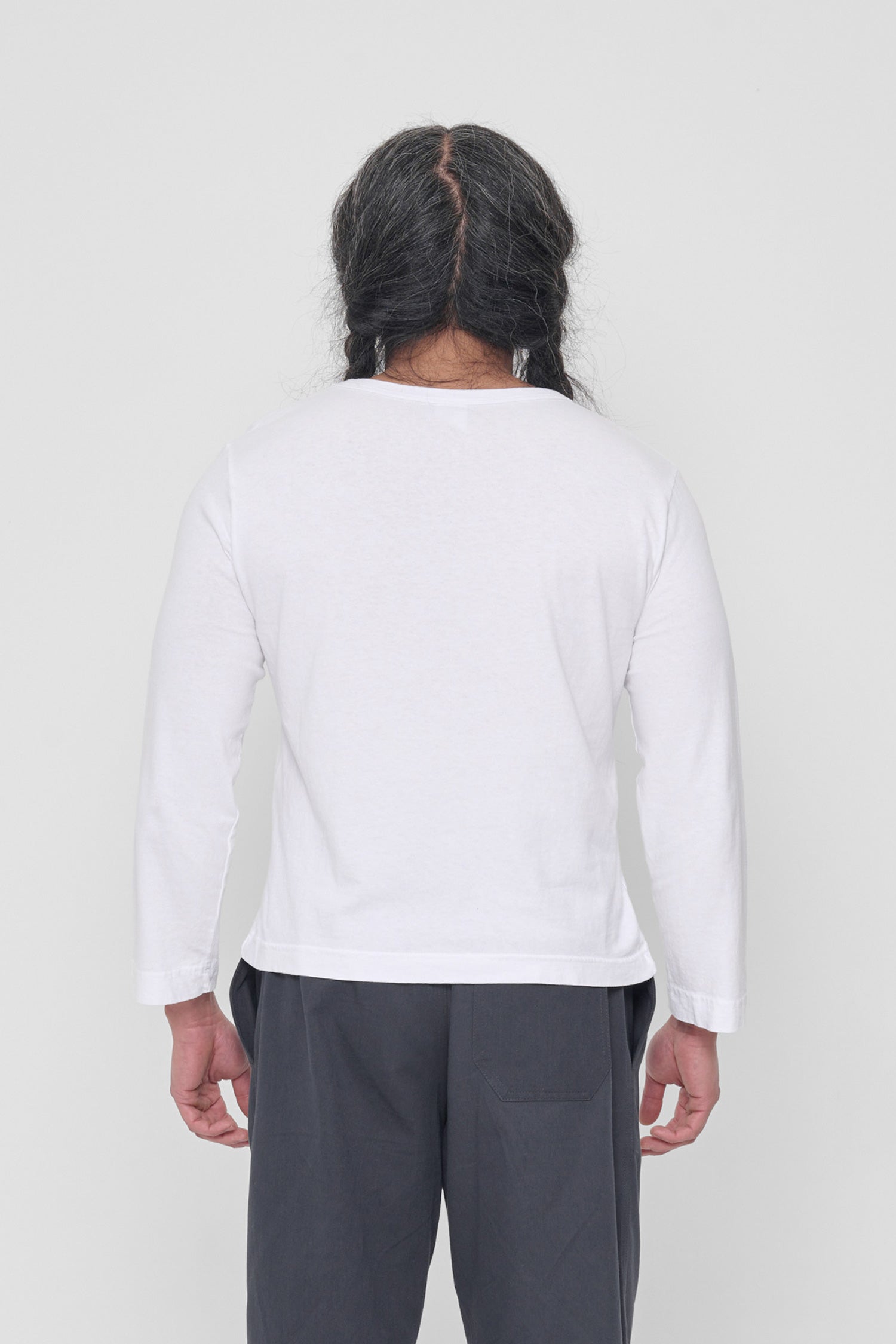 Back view: fitted across upper back with some ease at lower back.