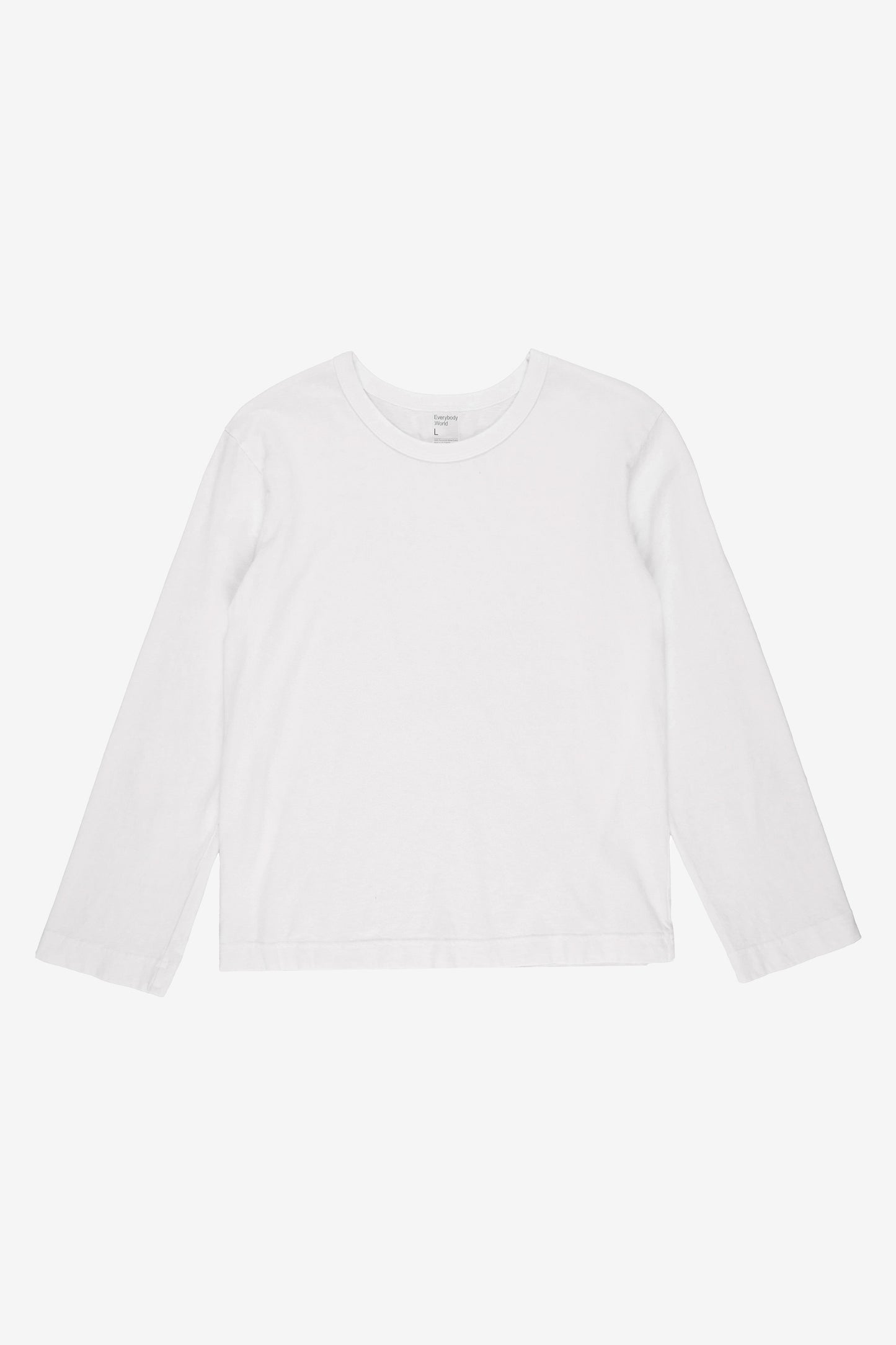 Flat lay showing slim rectangular body and straight long sleeves.