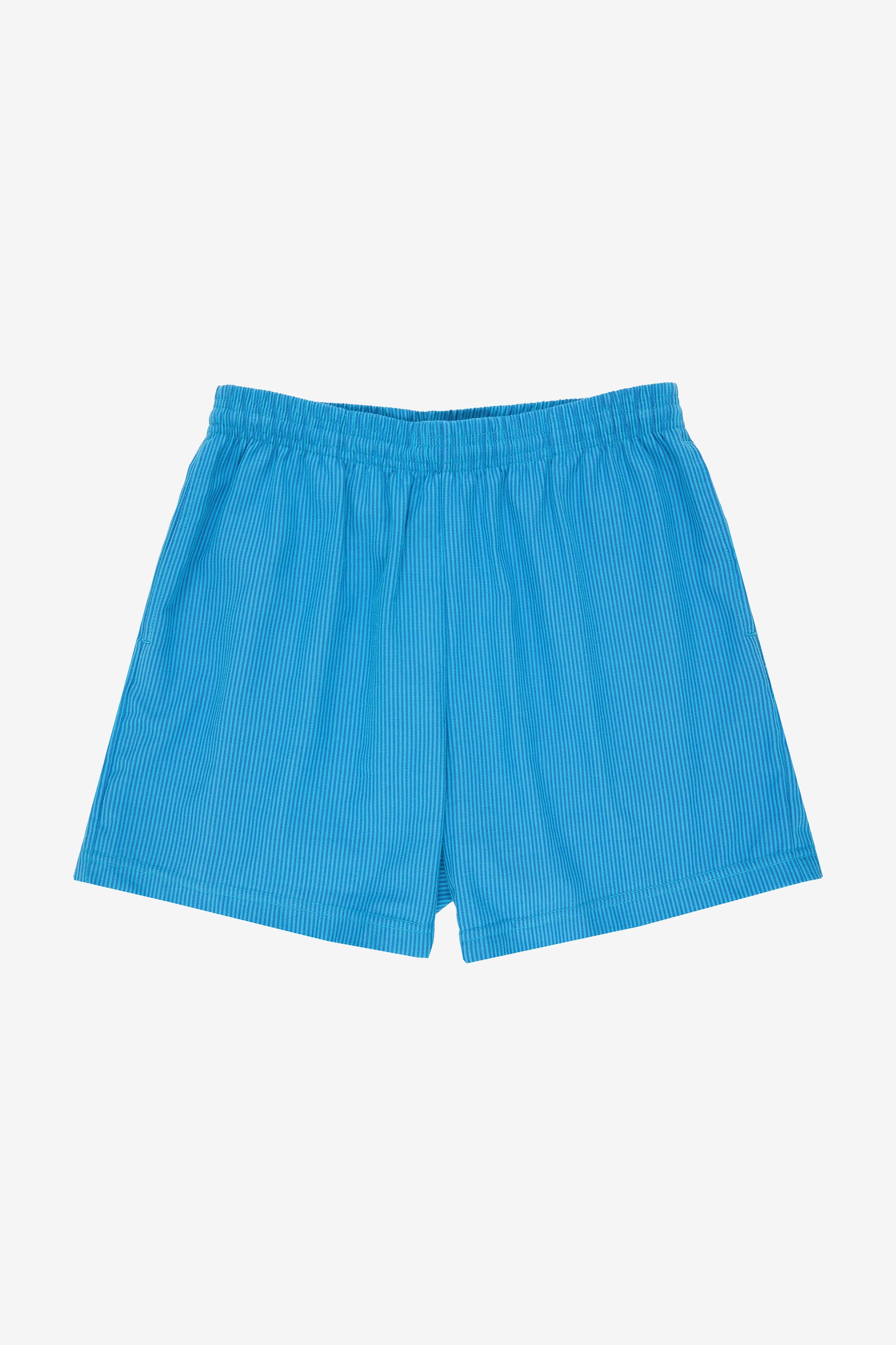 Flat lay shows leg opening is the same width from top of the thigh, down to the hem.