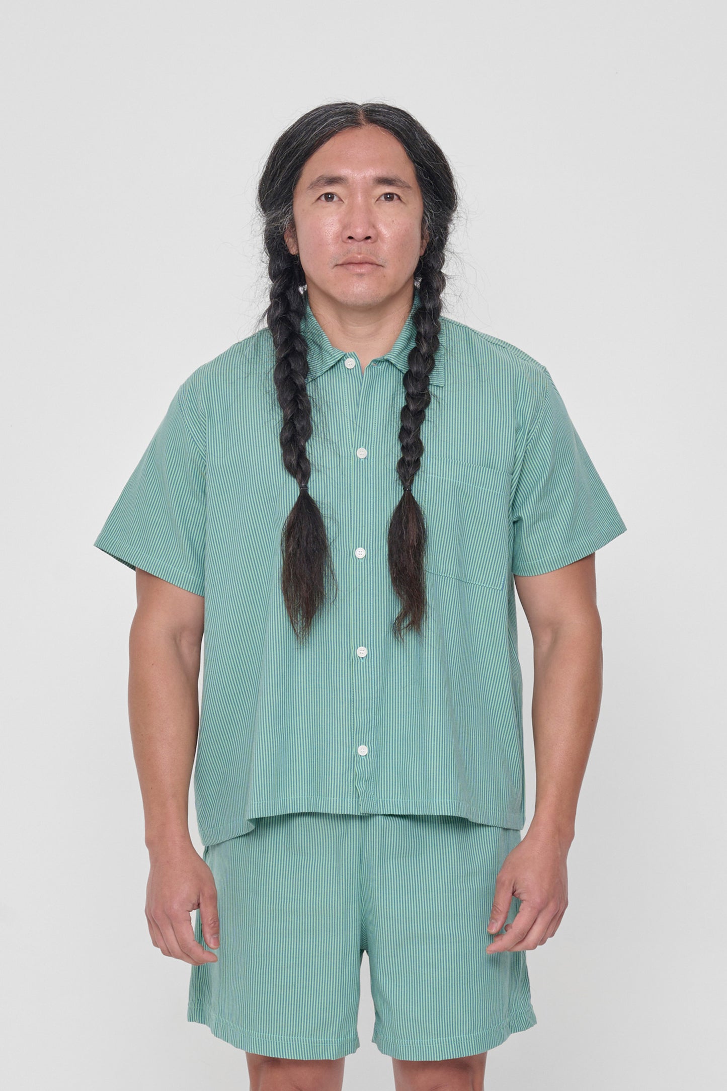 5'11" man wearing size L Nice Grass Stripe Short Sleeve Button-Up Shirt. Hem ends at lower hip. 