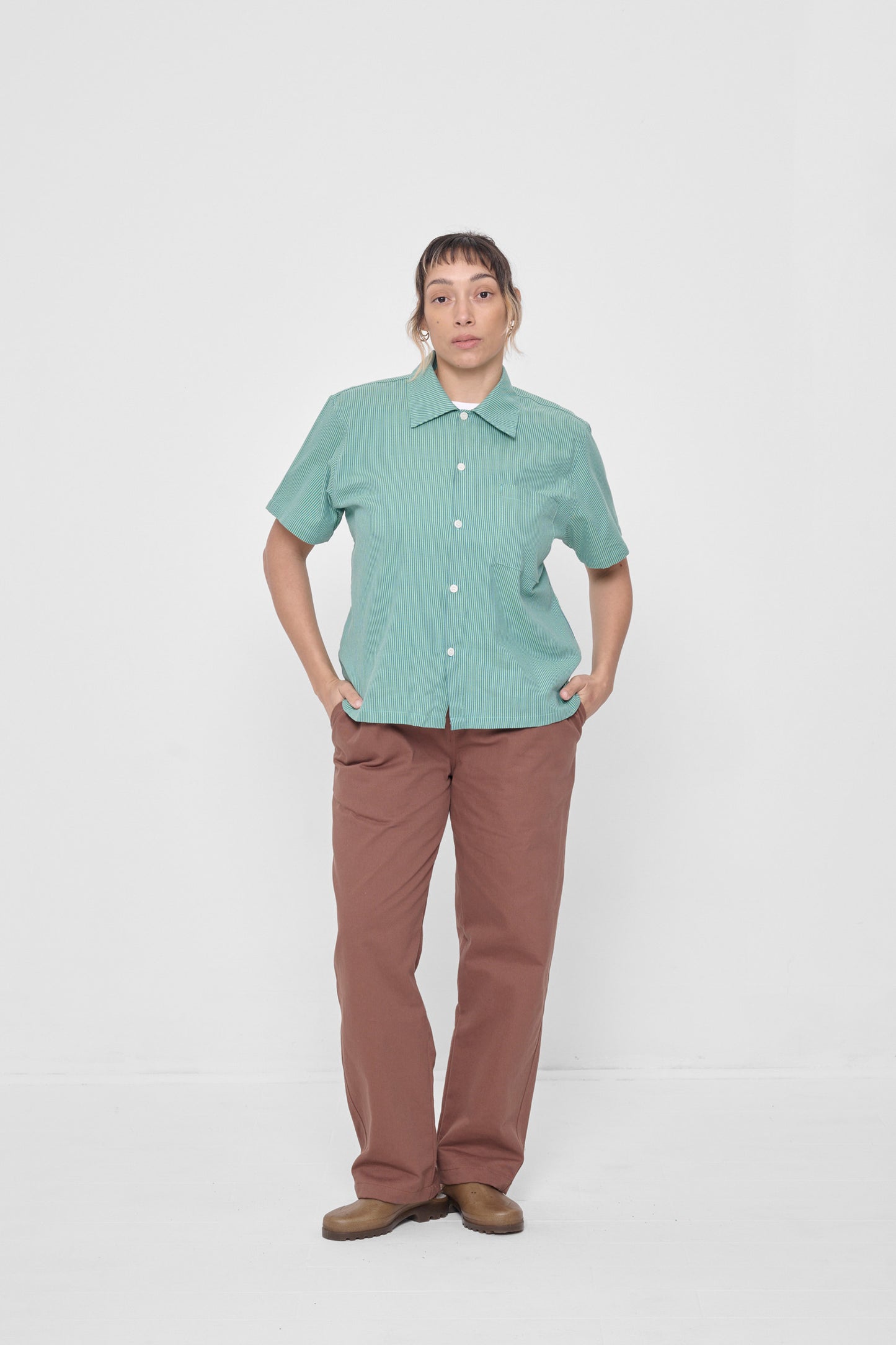 Styled with Potting Soil Life Uniform Pants and Plasticana Opana Mules. 