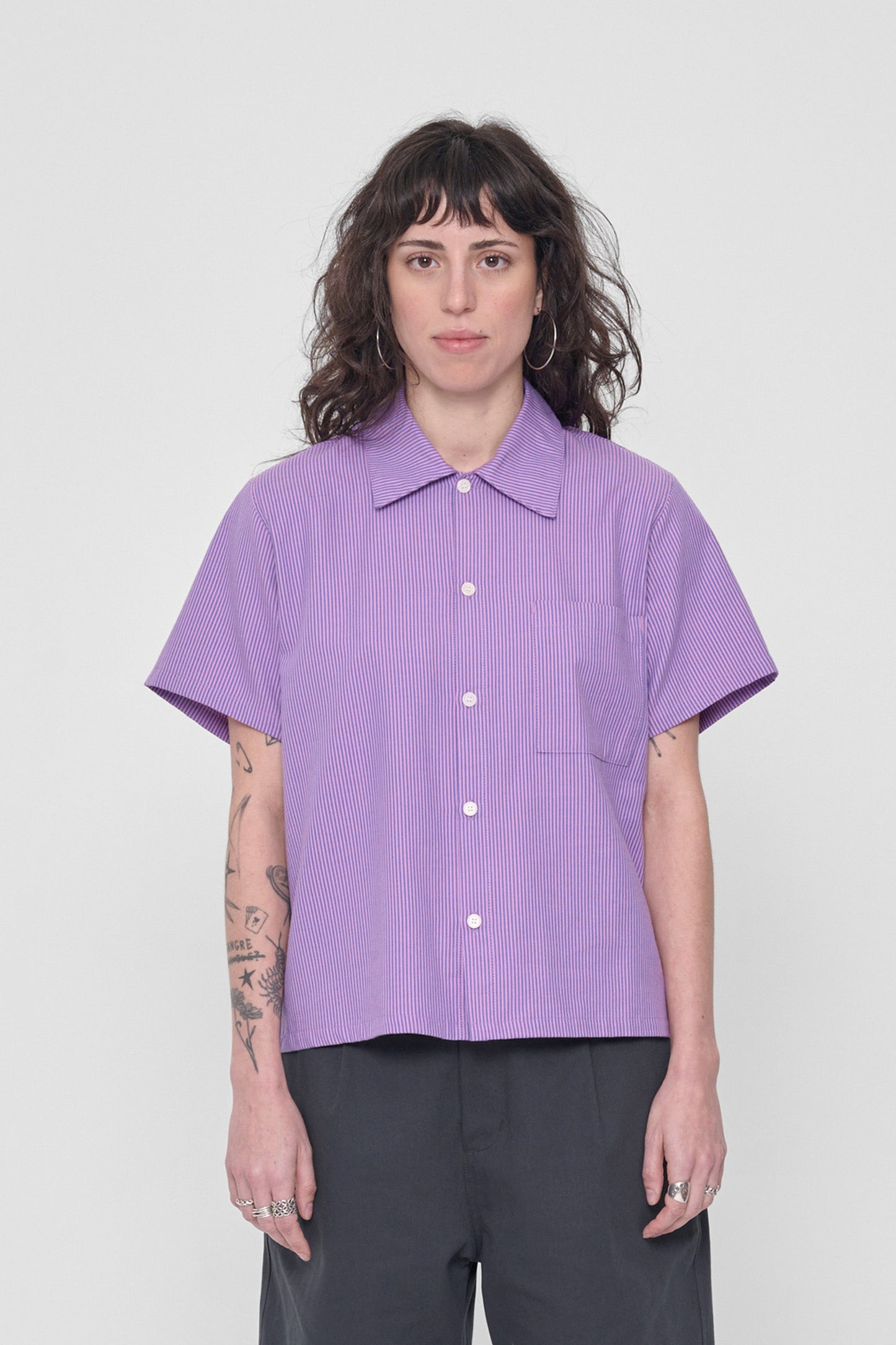 5'6" woman wearing size S Pixie Stripe Short Sleeve Button-Up Shirt. Hem ends mid hip. 