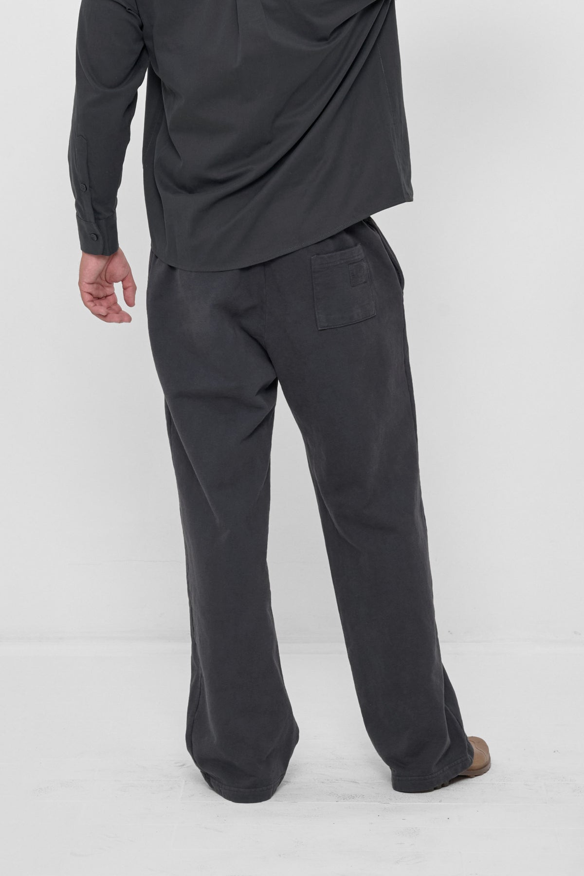 Trash Fleece Apartment Pants in Slate – back view on model