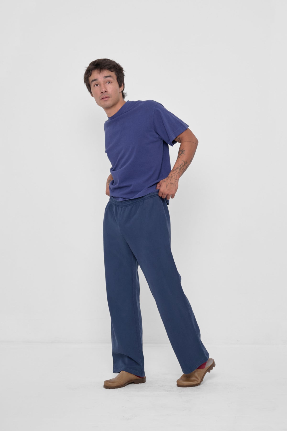 Trash Fleece Apartment Pants in Washed Navy – front view on model, styled with matching Boxier Trash Tee