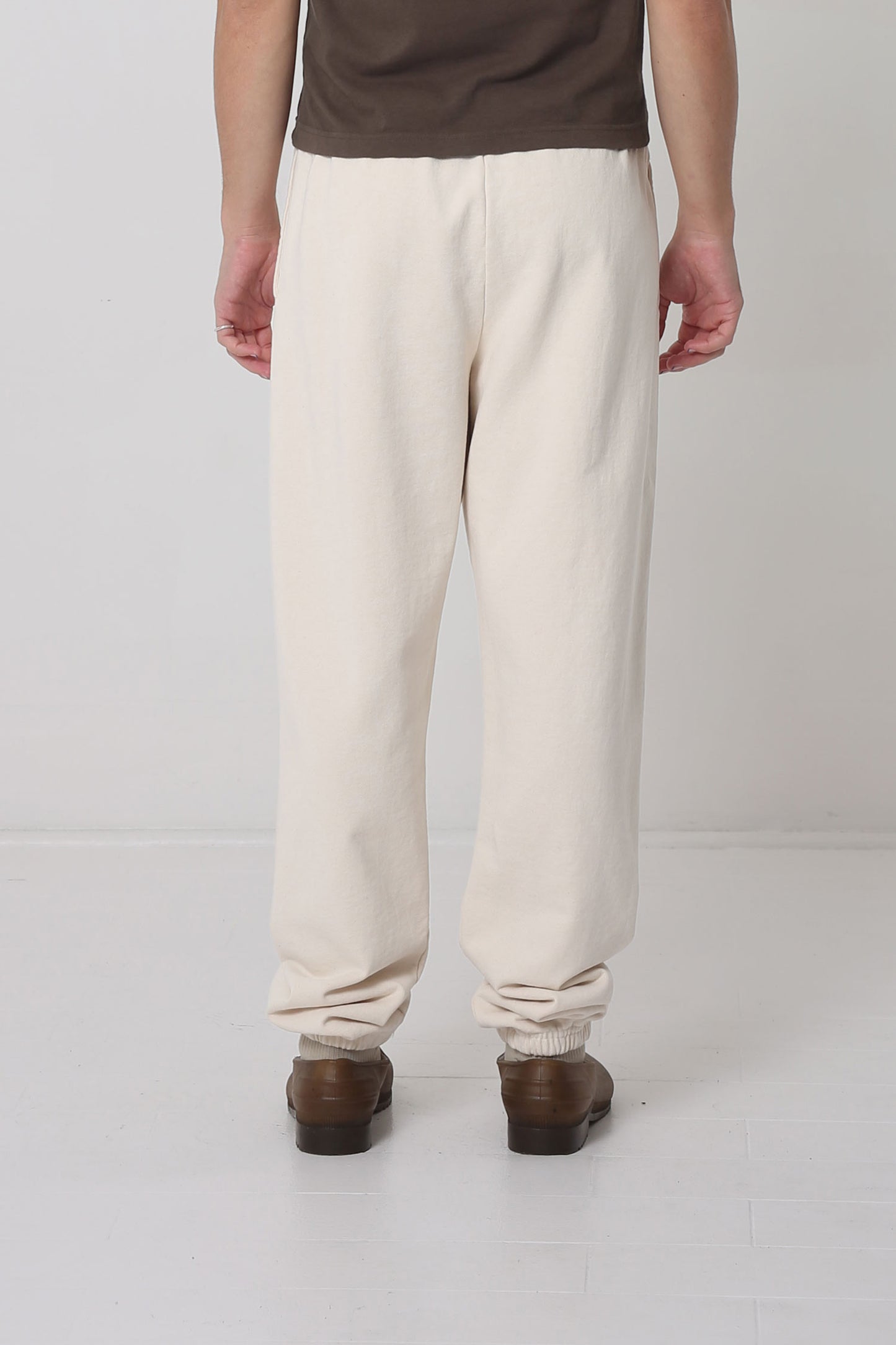 Back view: relaxed fit throughout, except for cuffs at the hem.