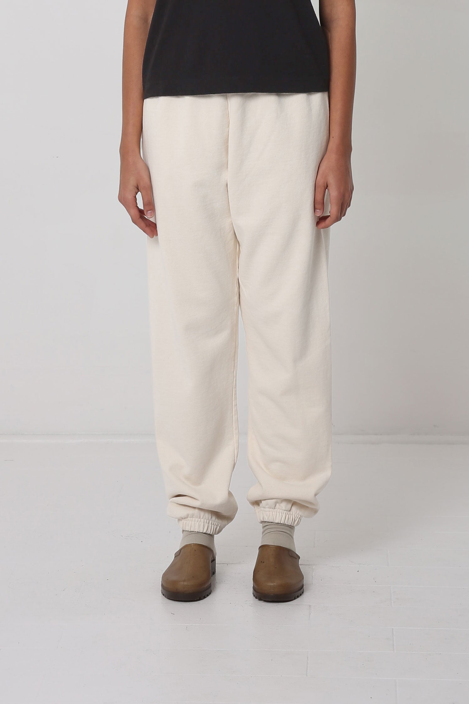 5'10" person in size S Scour Trash Sweatpants. Slight bunching at the ankles.