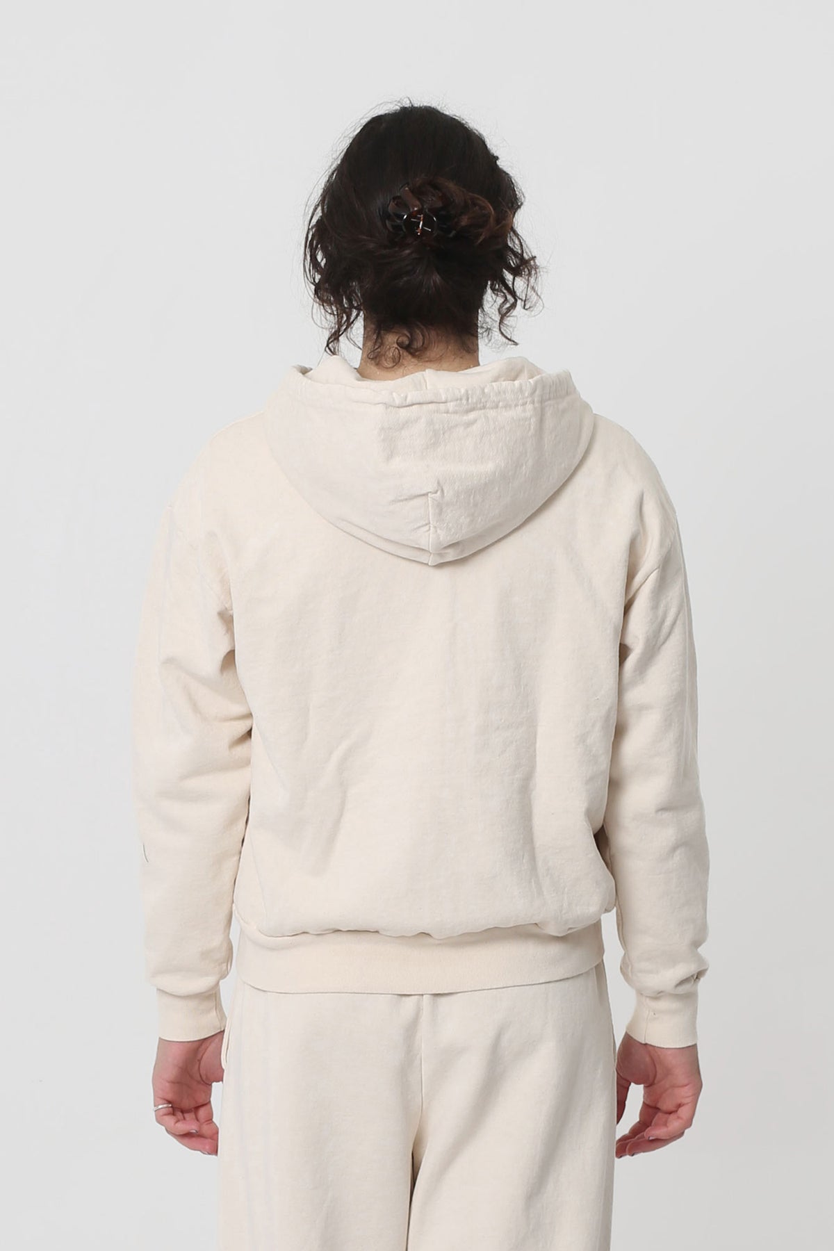Back view highlighting the hood.
