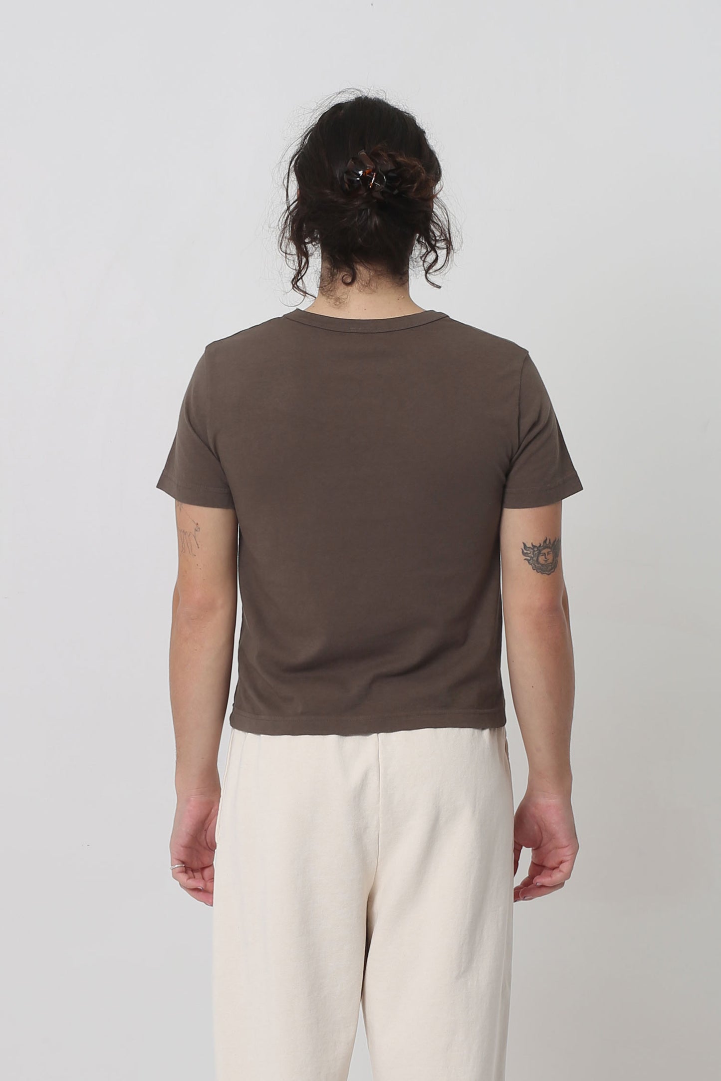 Back view: fitted across upper back with some ease at the lower back