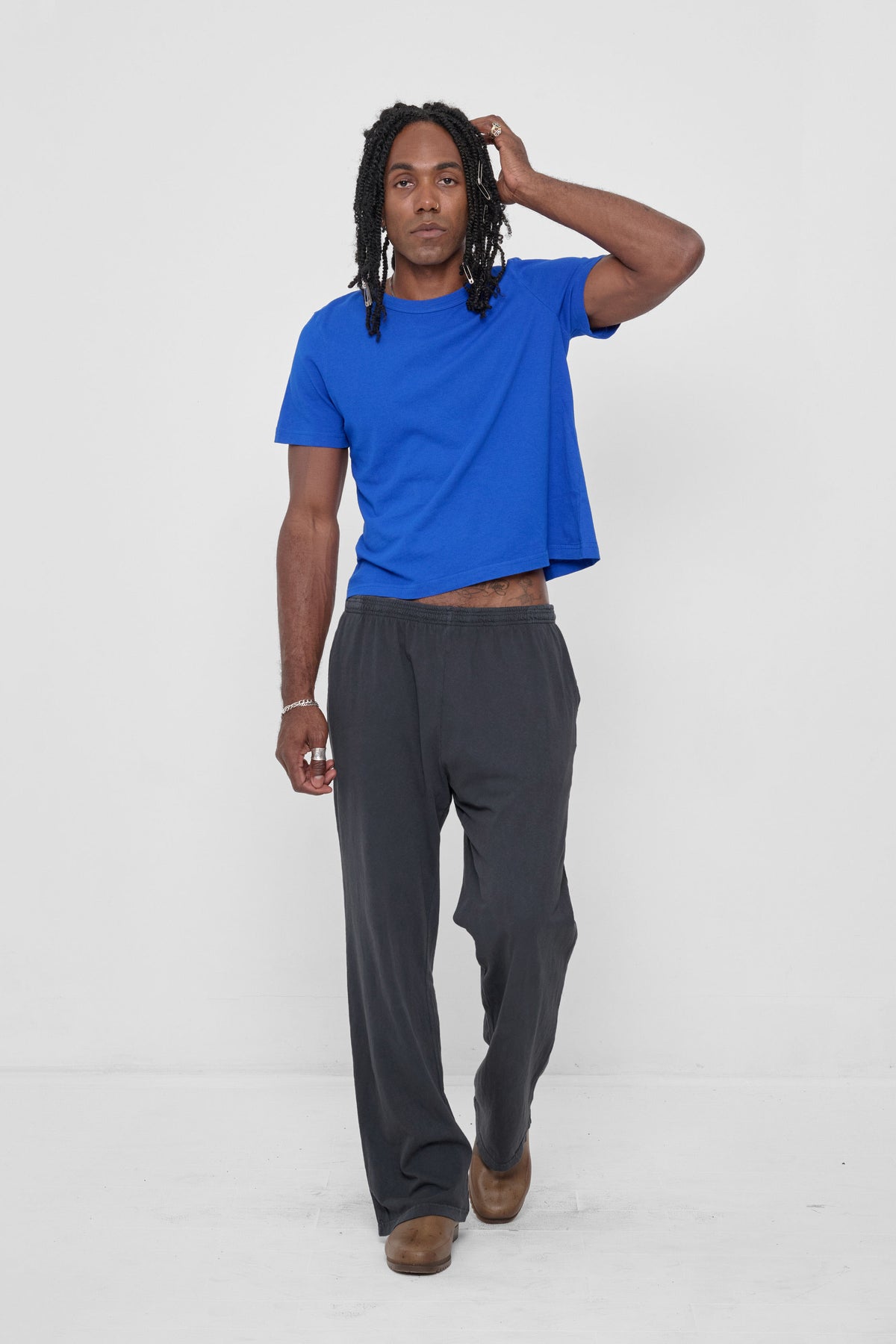 Tailored Trash Tee in Lapis – front view on model, styled with Slate Apartment Pants and Plasticana shoes
