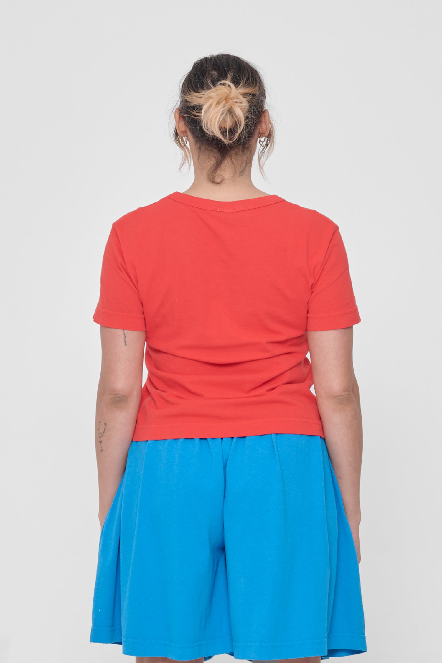 Back view: fitted across upper back with some ease at lower back.