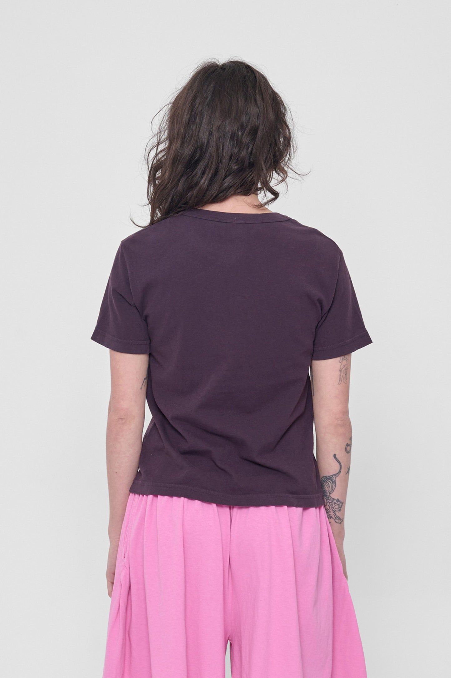 Back view: fitted across upper back with some ease at lower back.