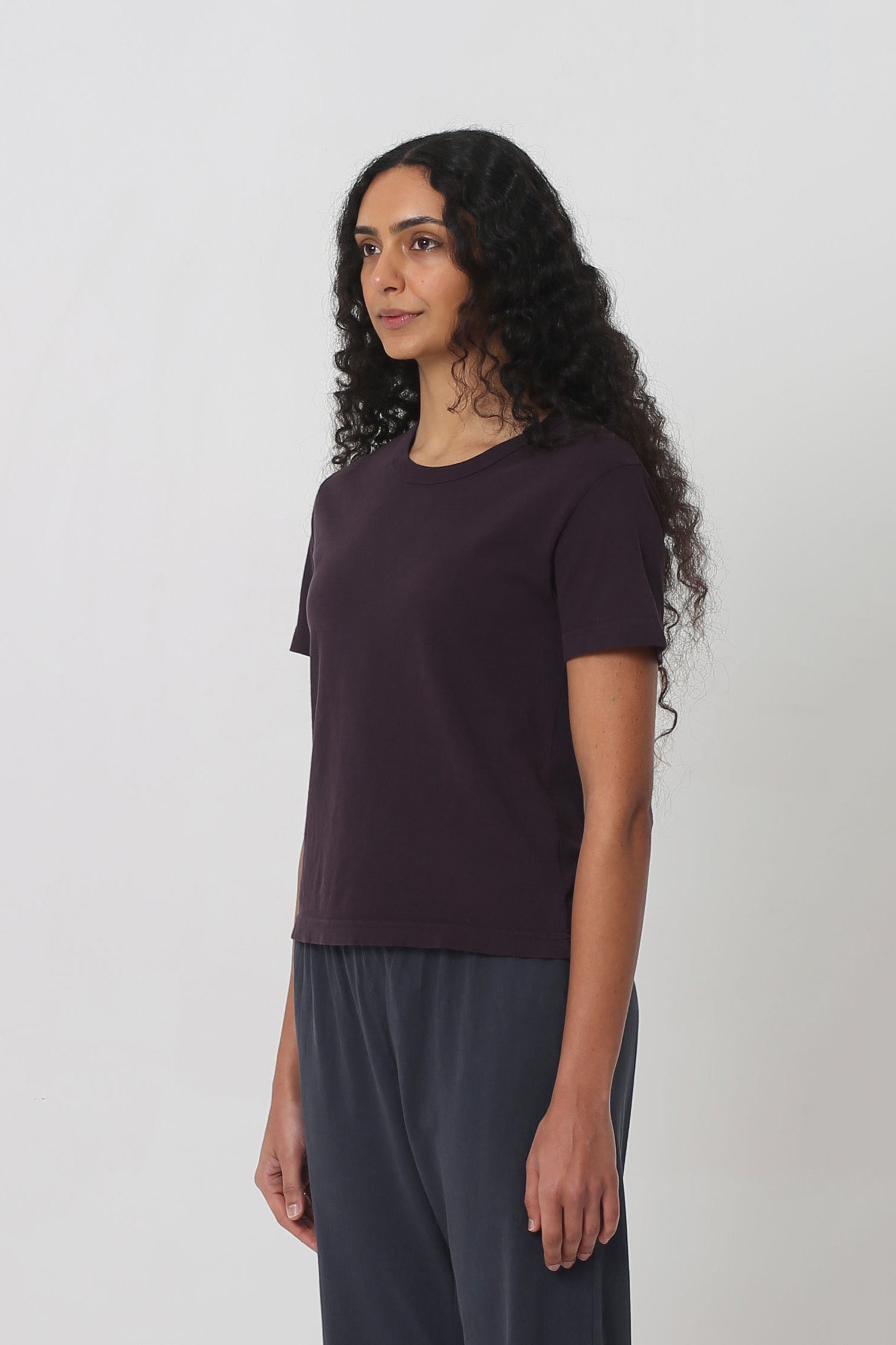 3/4 front view showing side seams and slim short sleeves.