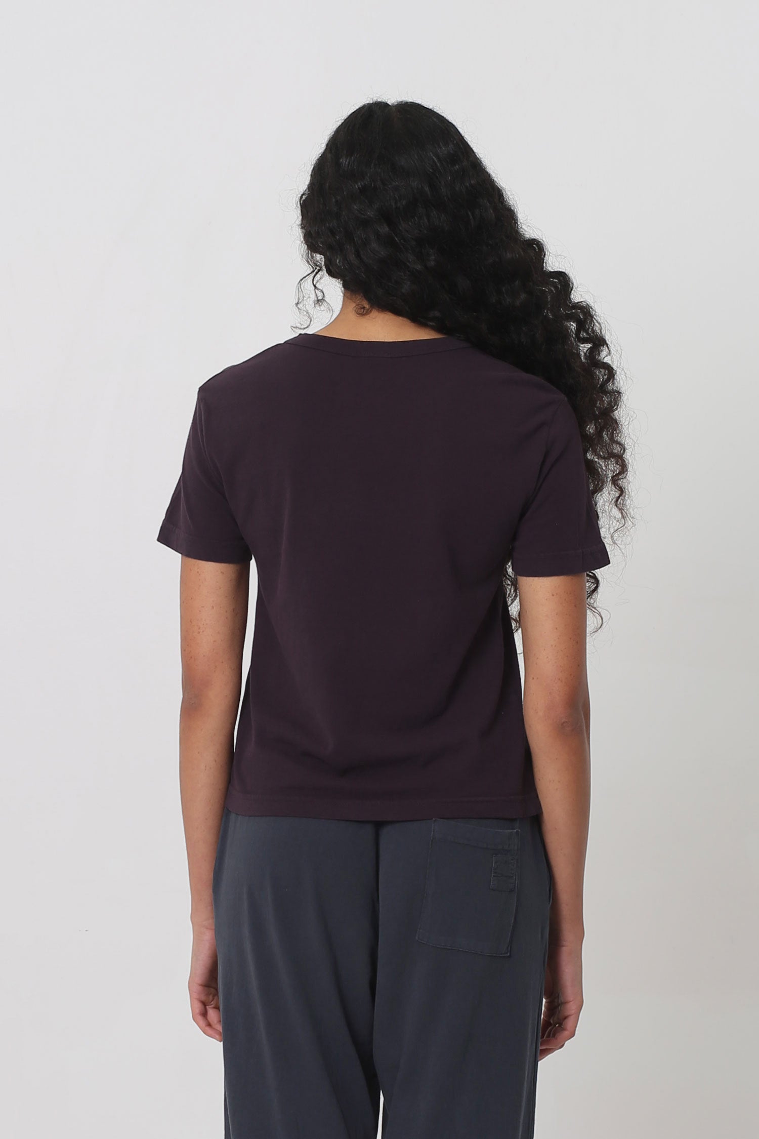 Back view: fitted across upper back with some ease at lower back.