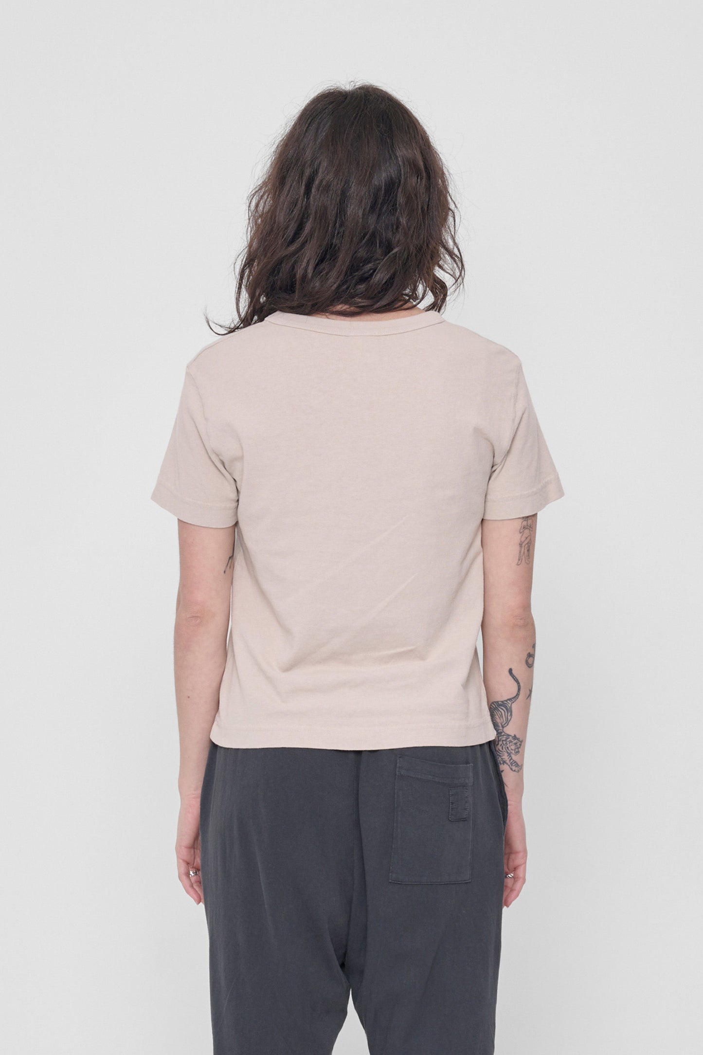 Back view: fitted across upper back with some ease at lower back.