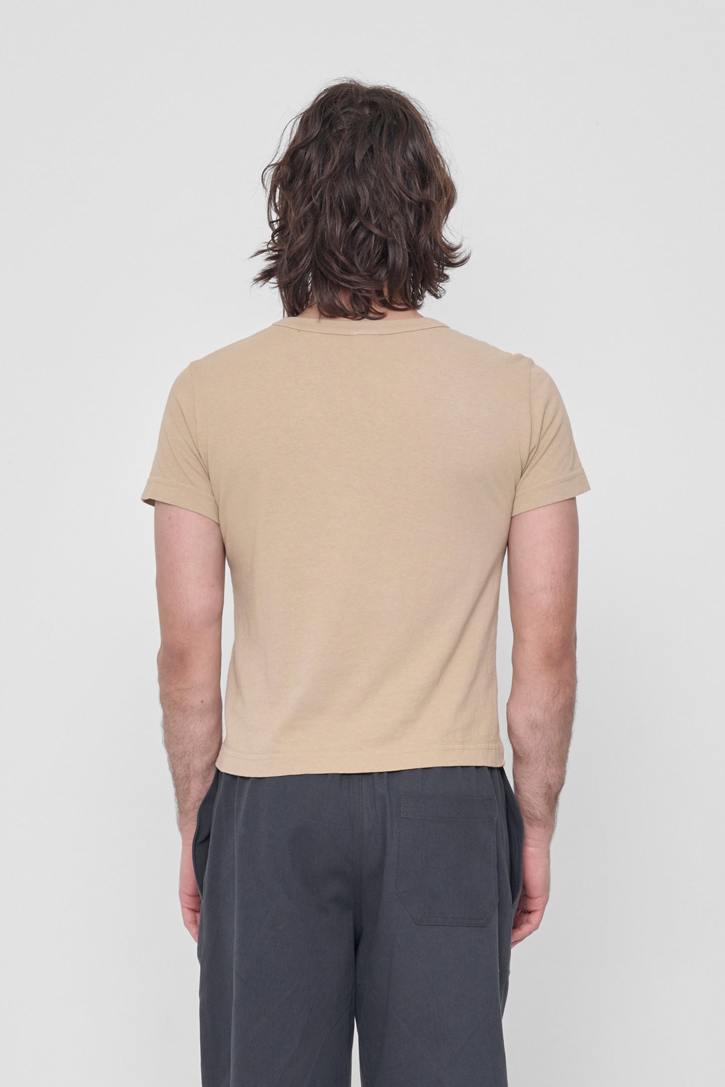 Back view: fitted across upper back with some ease at lower back.