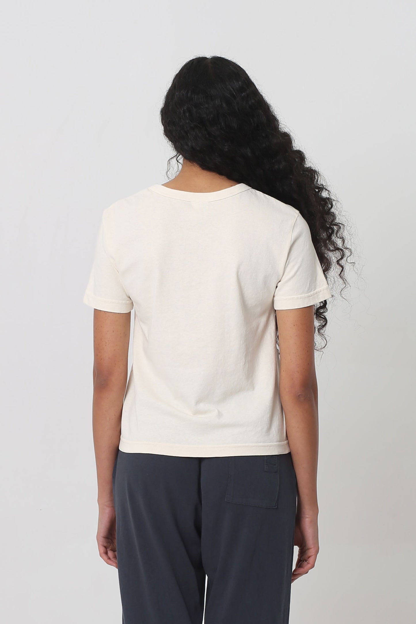 Back view: fitted across upper back with some ease at lower back.