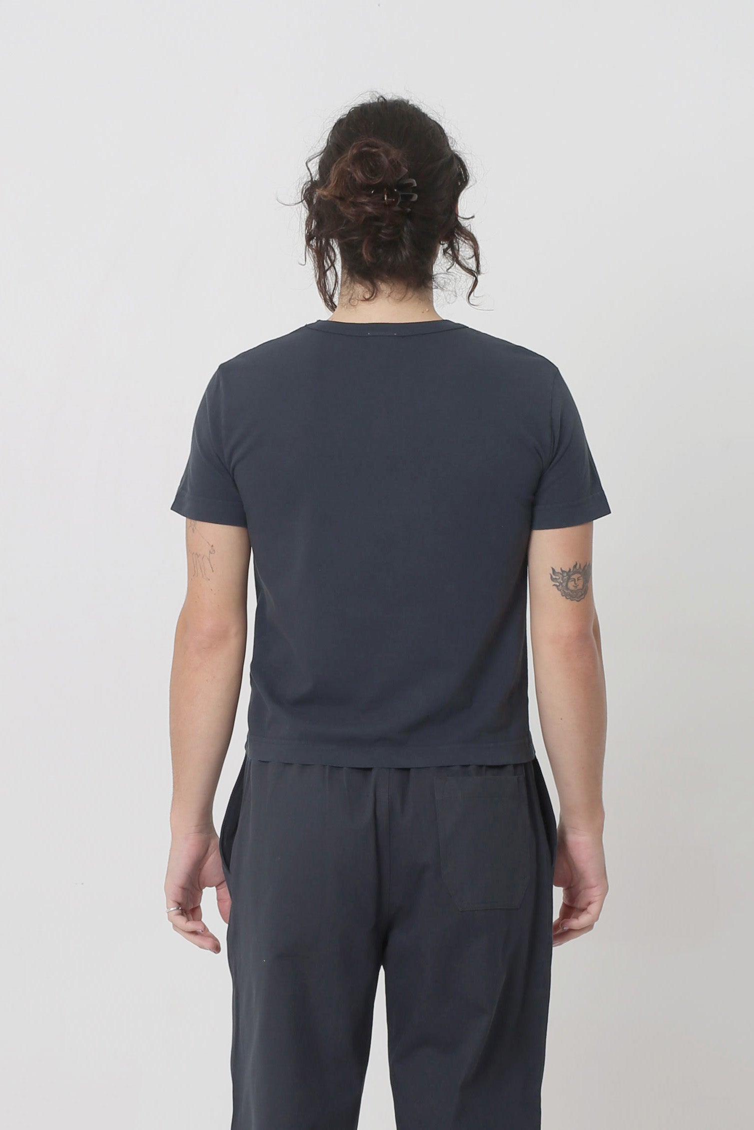 Back view: fitted across upper back with some ease at lower back.