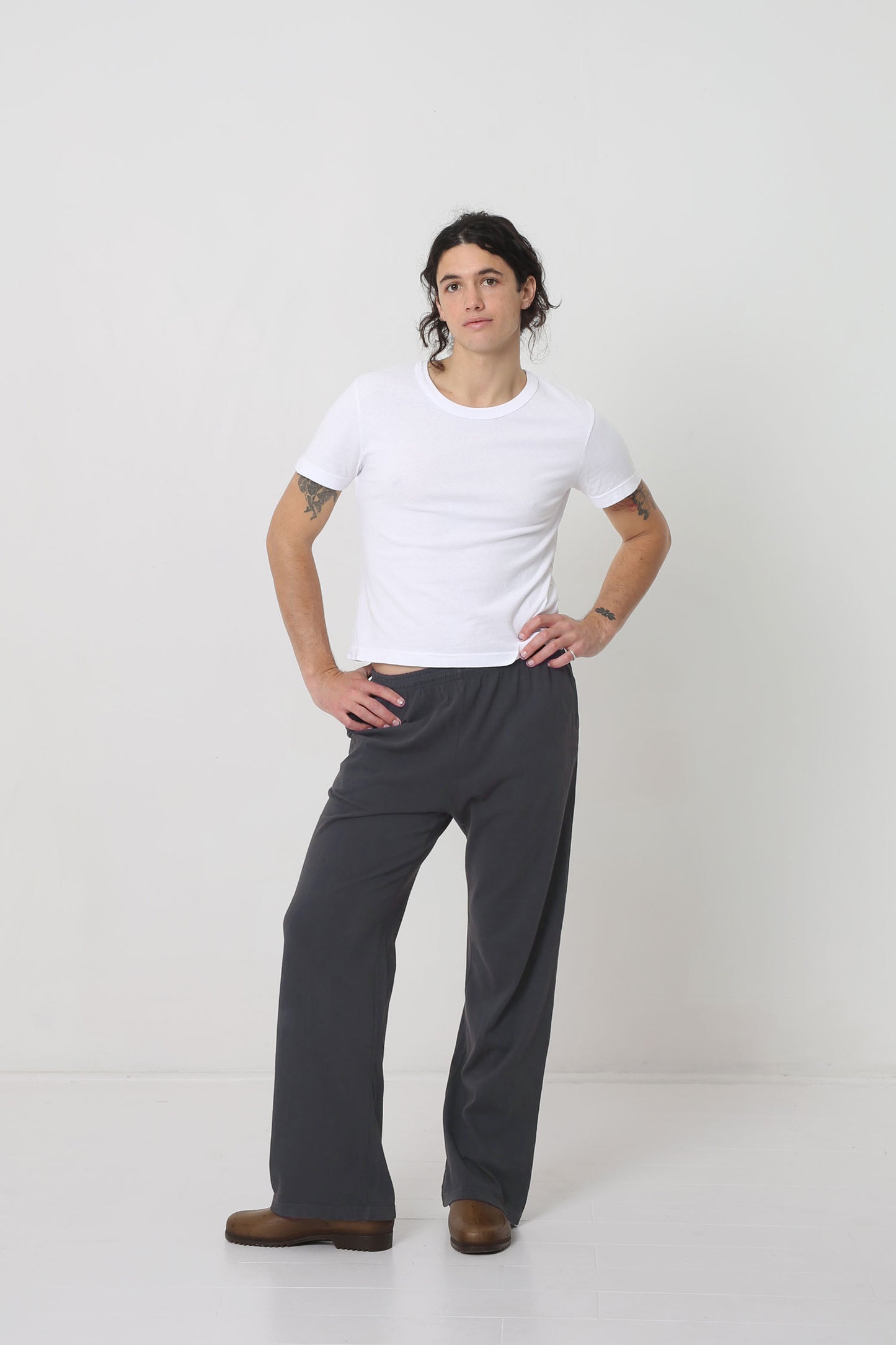 Styled with Slate Apartment Pants, showing a sliver of model's upper hip.