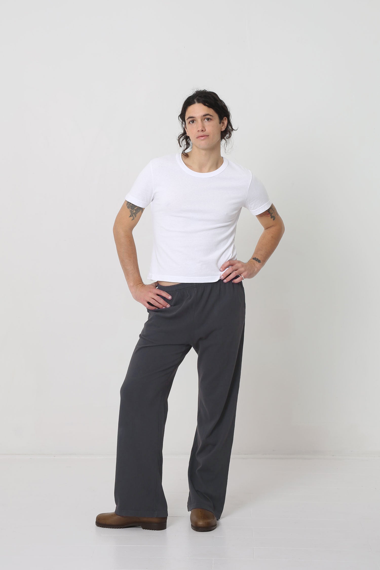 Styled with Slate Apartment Pants, showing a sliver of model's upper hip.