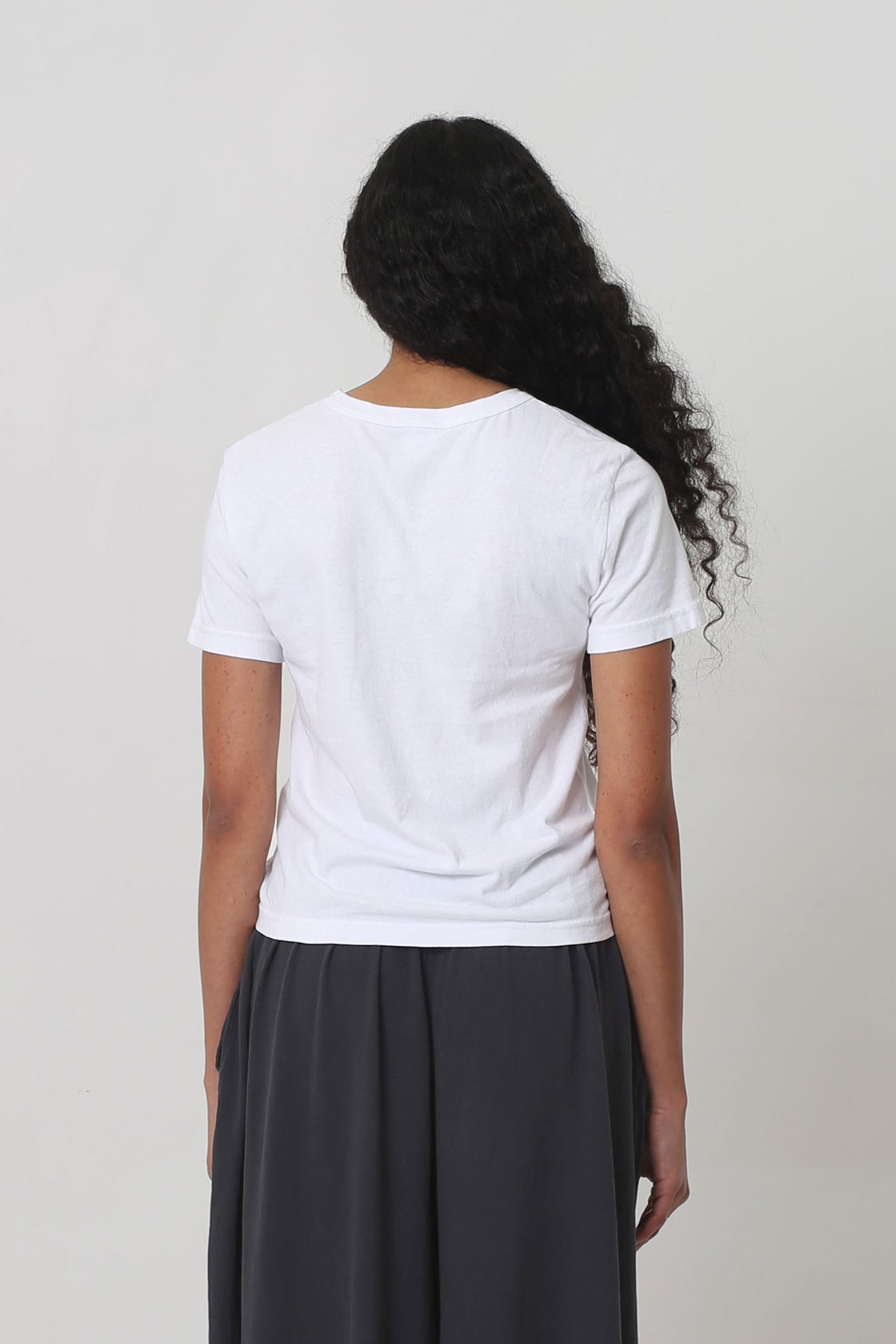 Tailored Trash Tee in White – back view on model