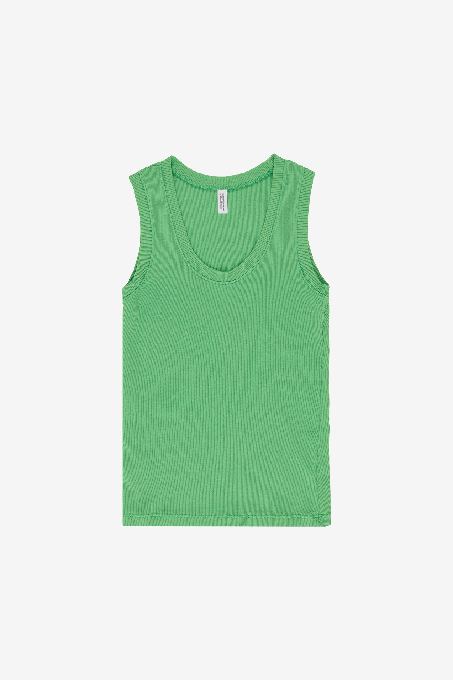 Flat lay reveals the tank’s unstretched form, which concaves slightly at the waist.