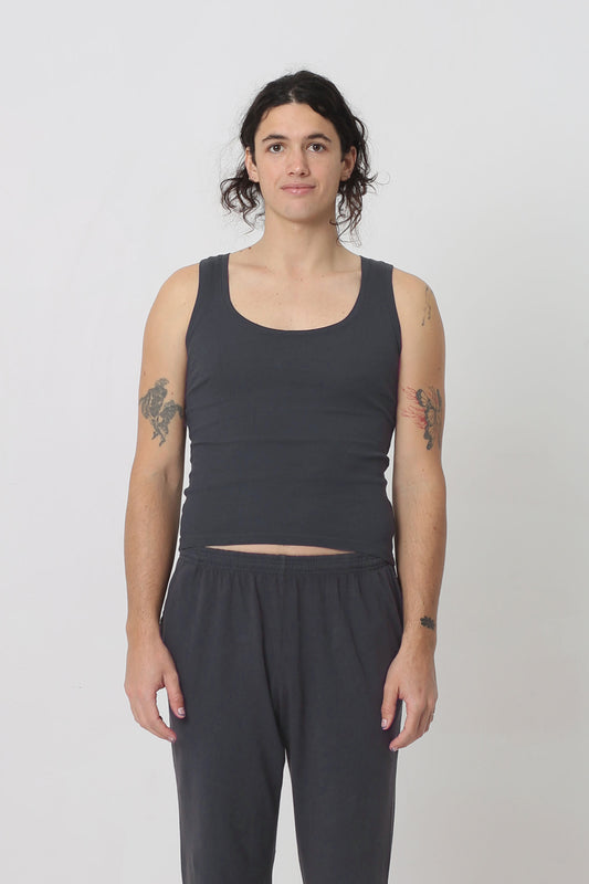 6' person in a size S The Tank in Slate. Hem ends just above their hip bones.