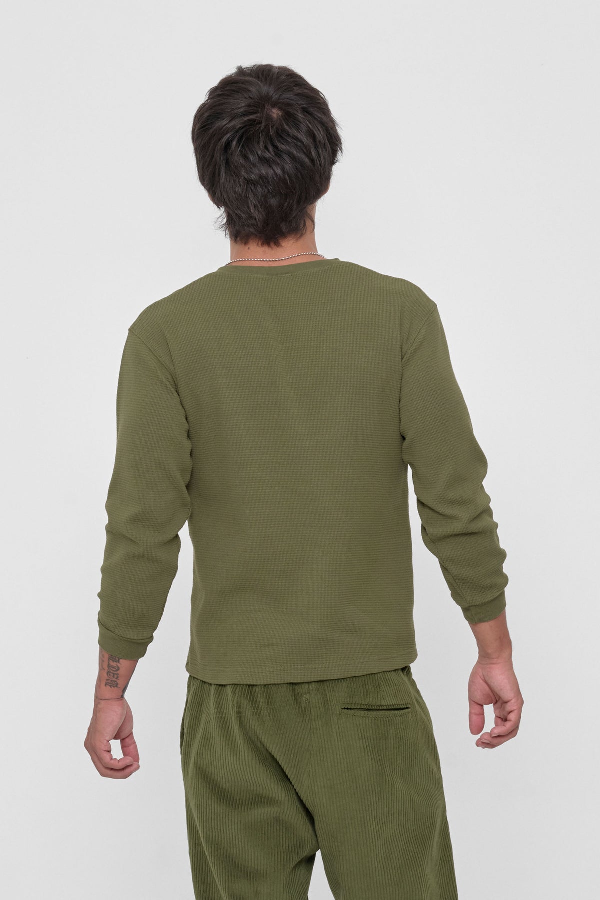 Thermal Henley Trash Tee in Olive – back view on model